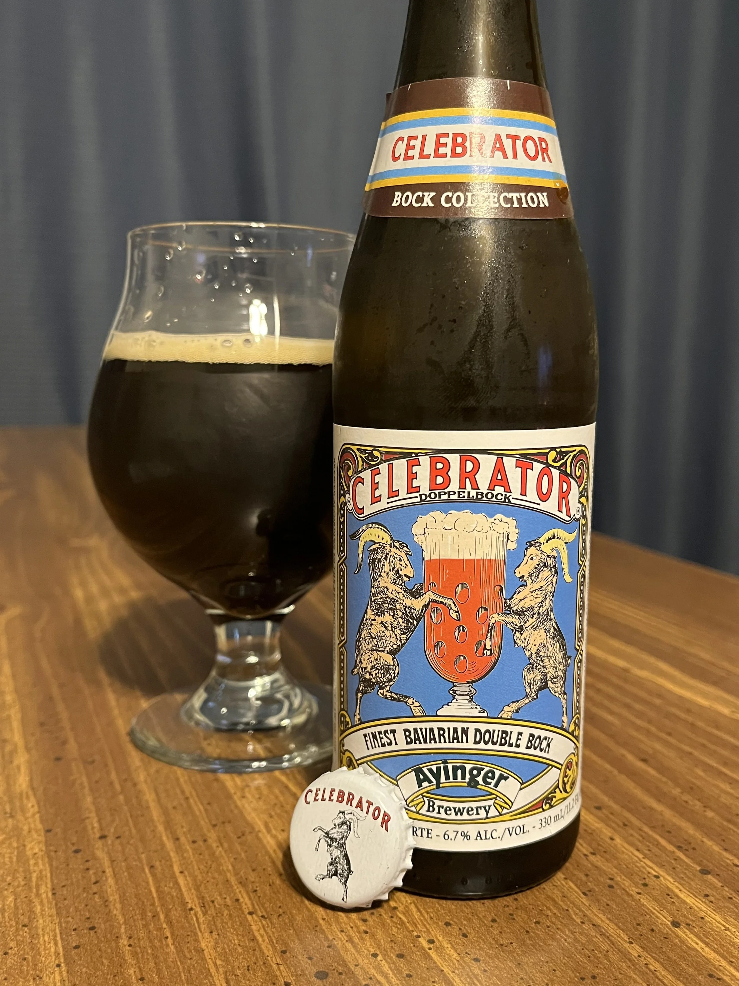 tulip glass with Celebrator from Ayinger in a bottle, bottlecap