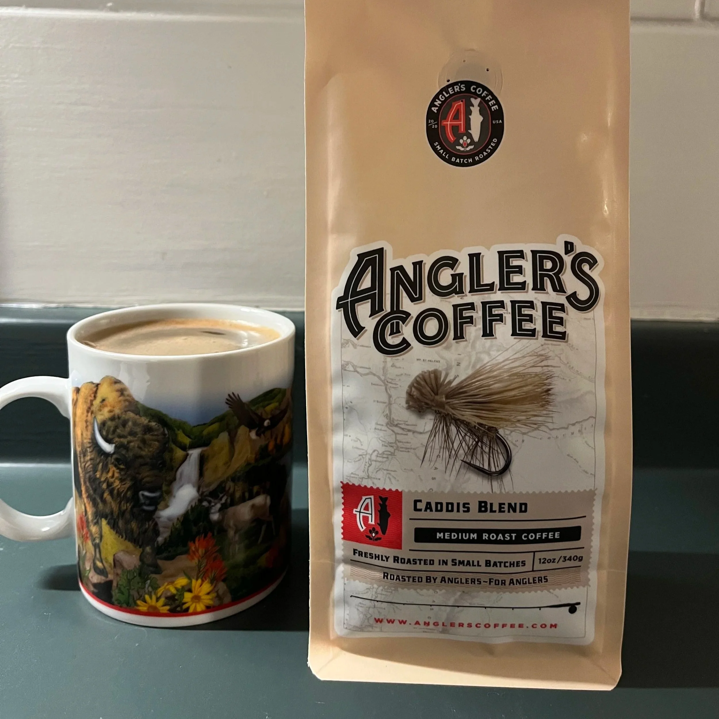 coffee mug and bag of coffee beans