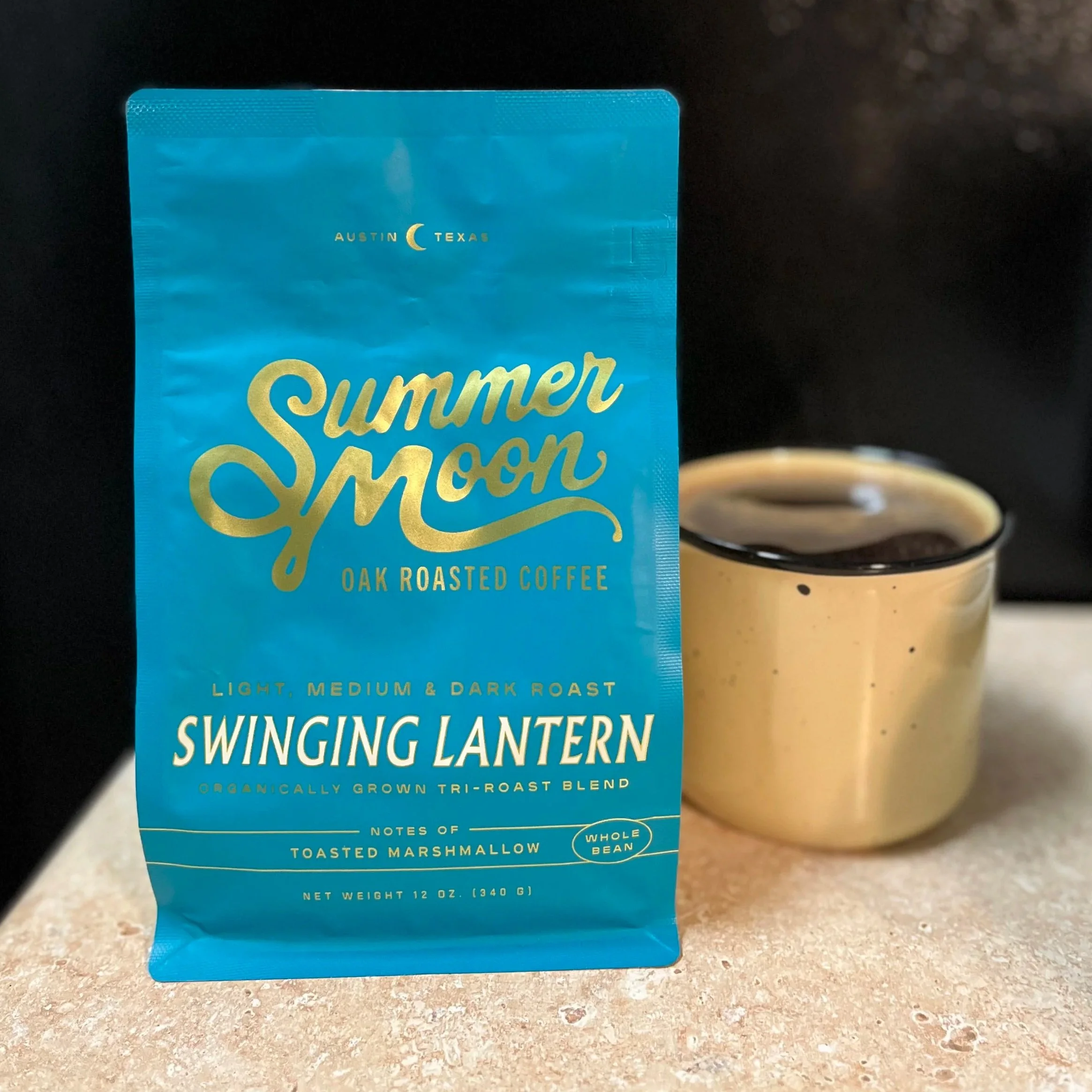 coffee mug and bag of coffee beans
