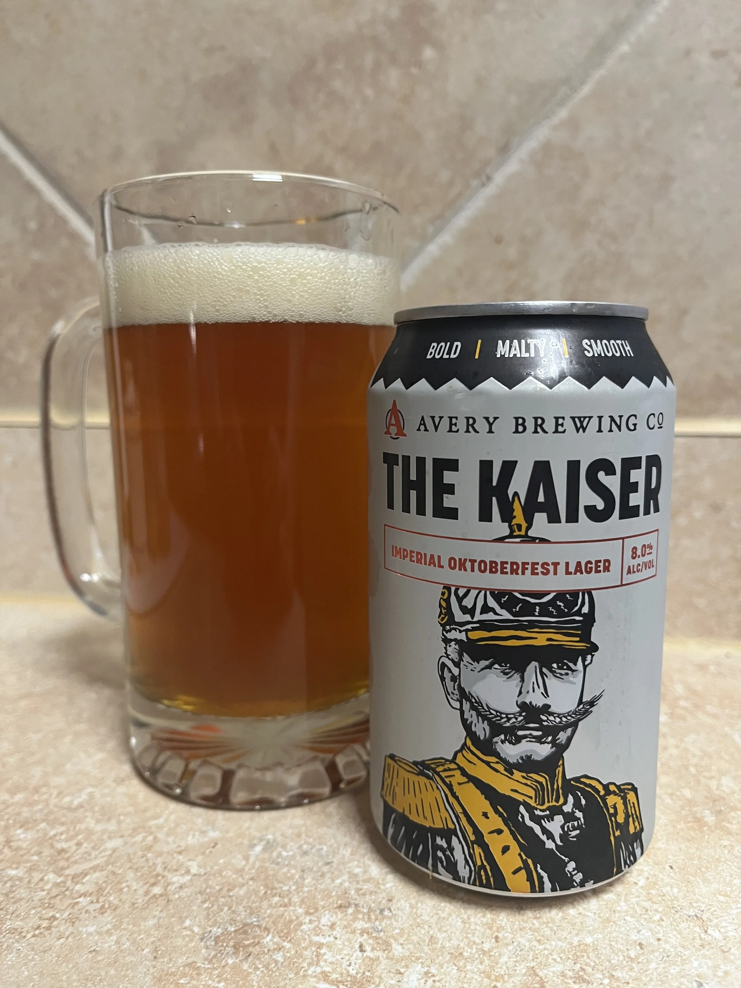 beer stein next to beer can