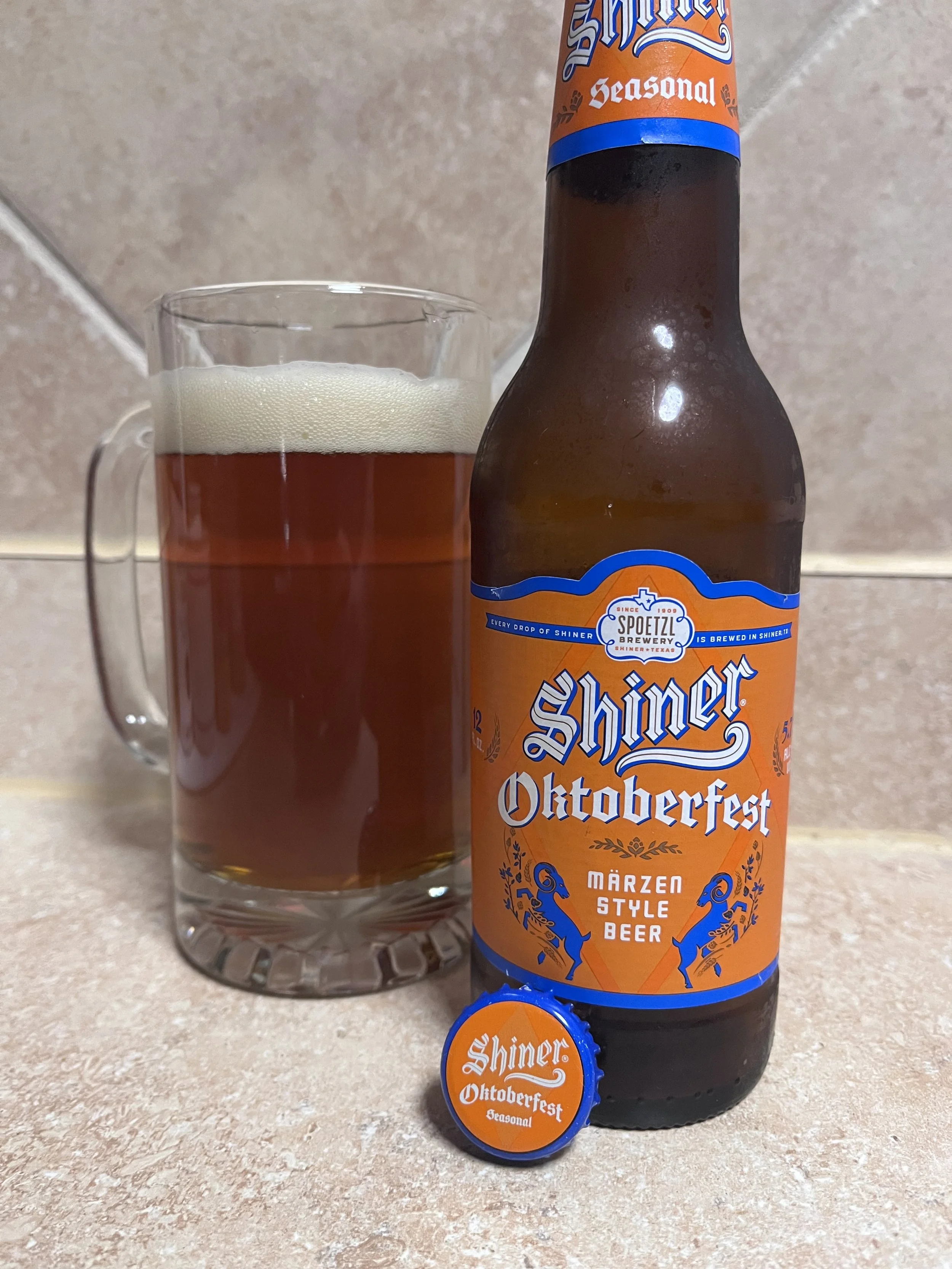 beer stein next to a Shiner bottle
