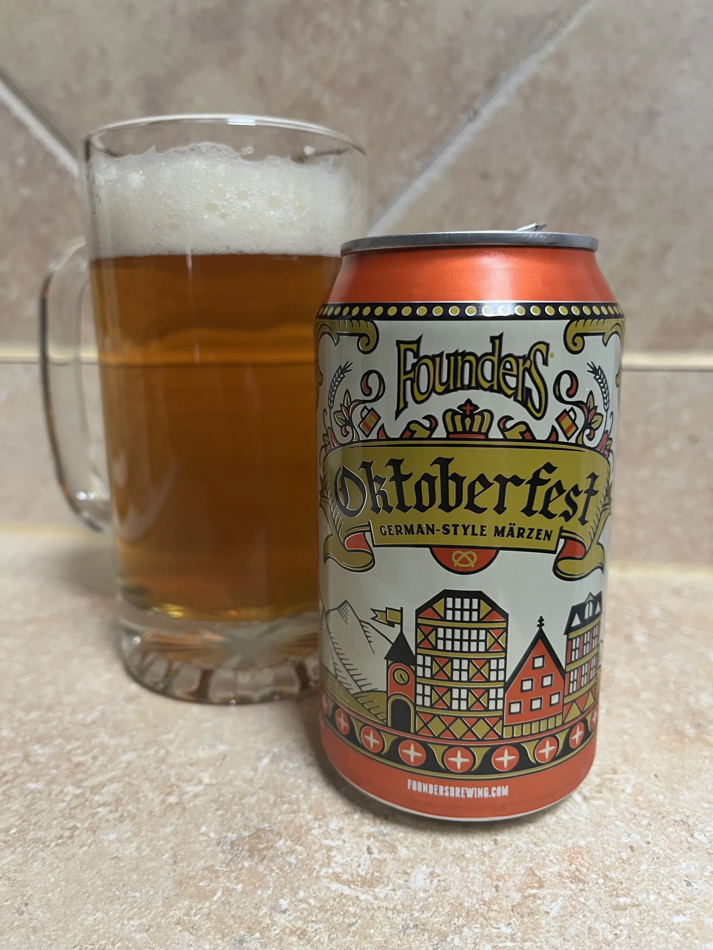 beer stein next to a beer can