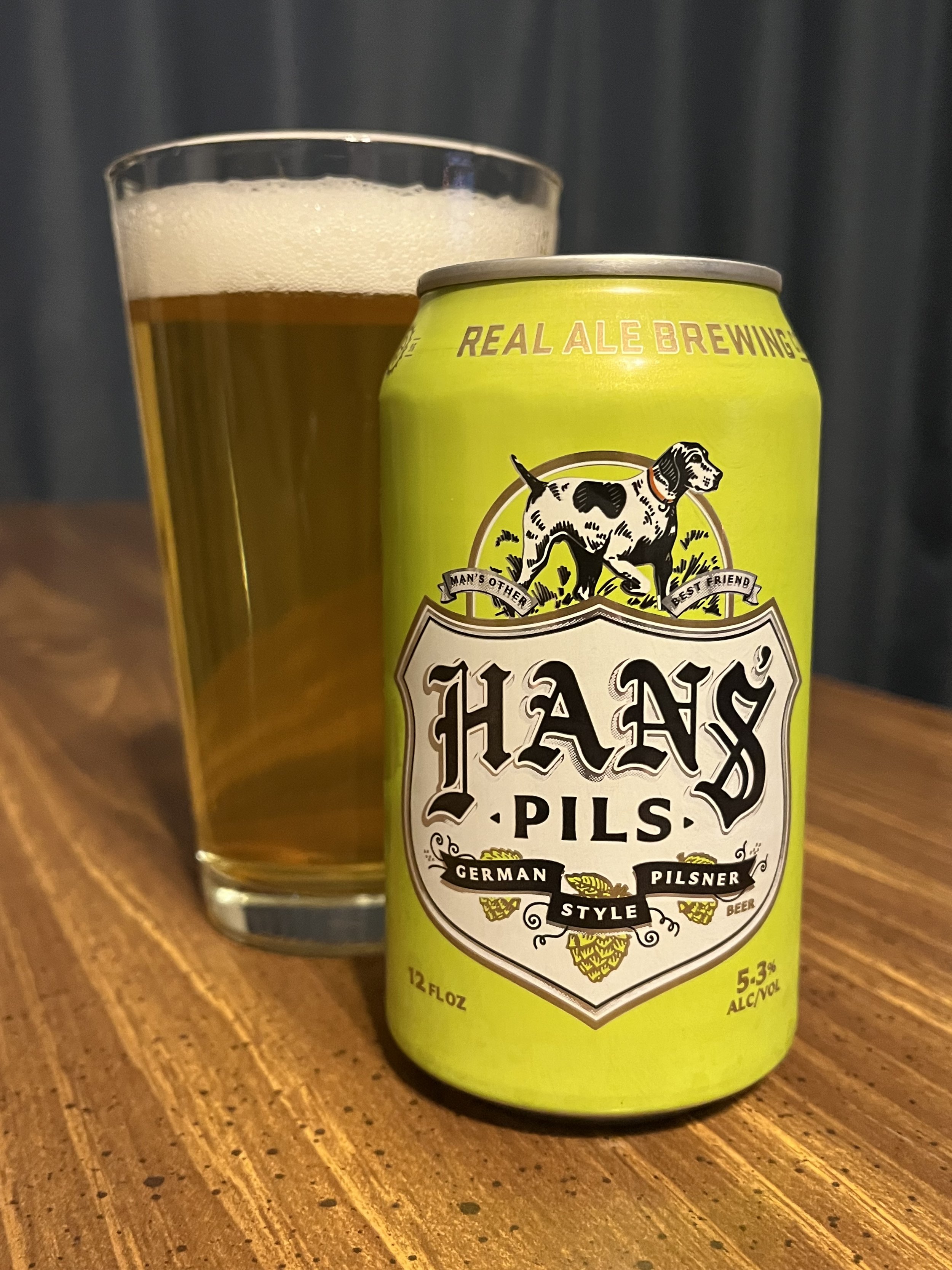 pub glass next to a Real Ale beer can