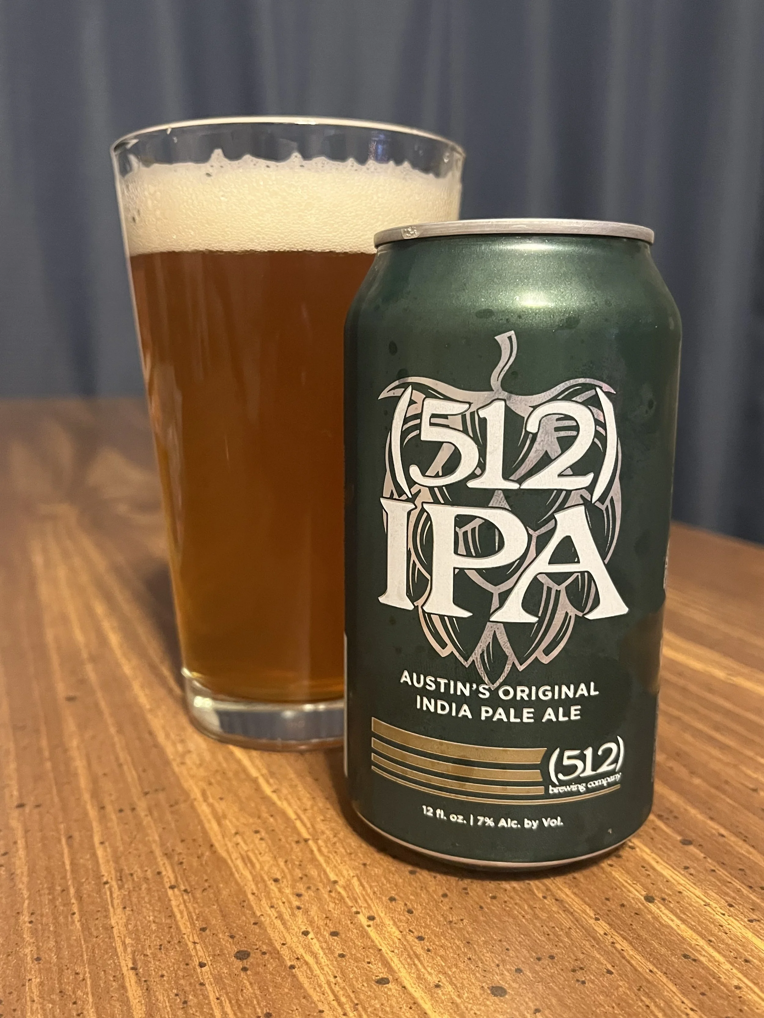 pub glass next to 512 beer can