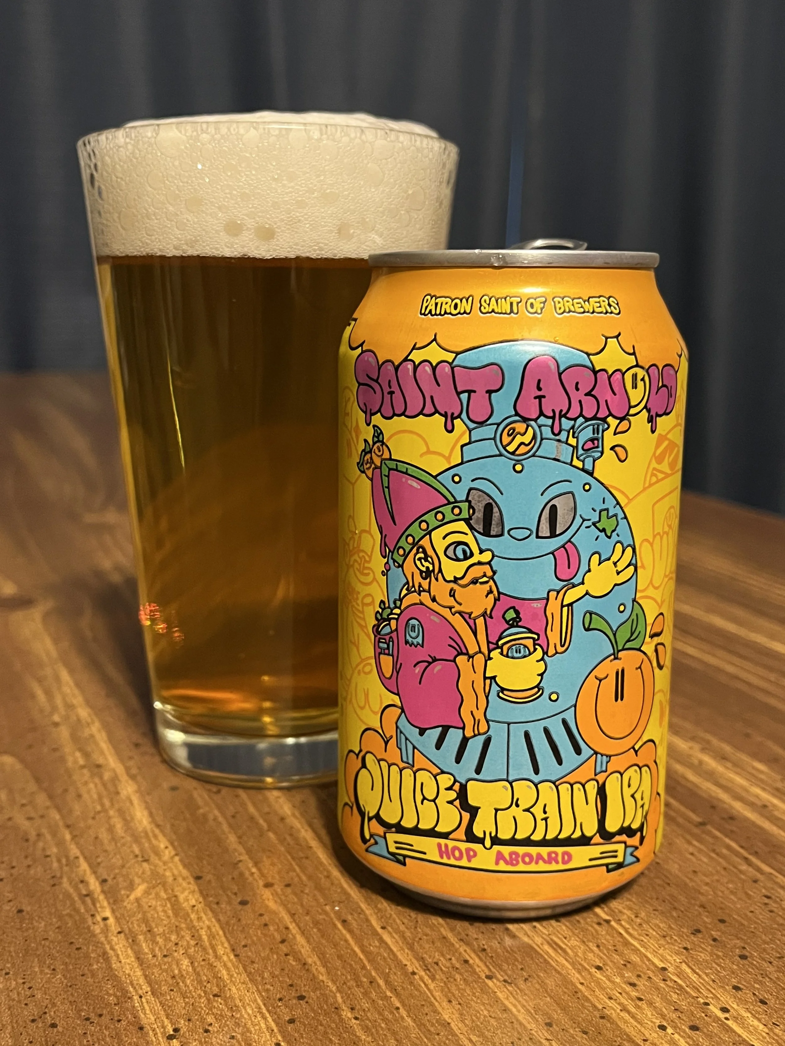 pub glass with a Saint Arnold beer can
