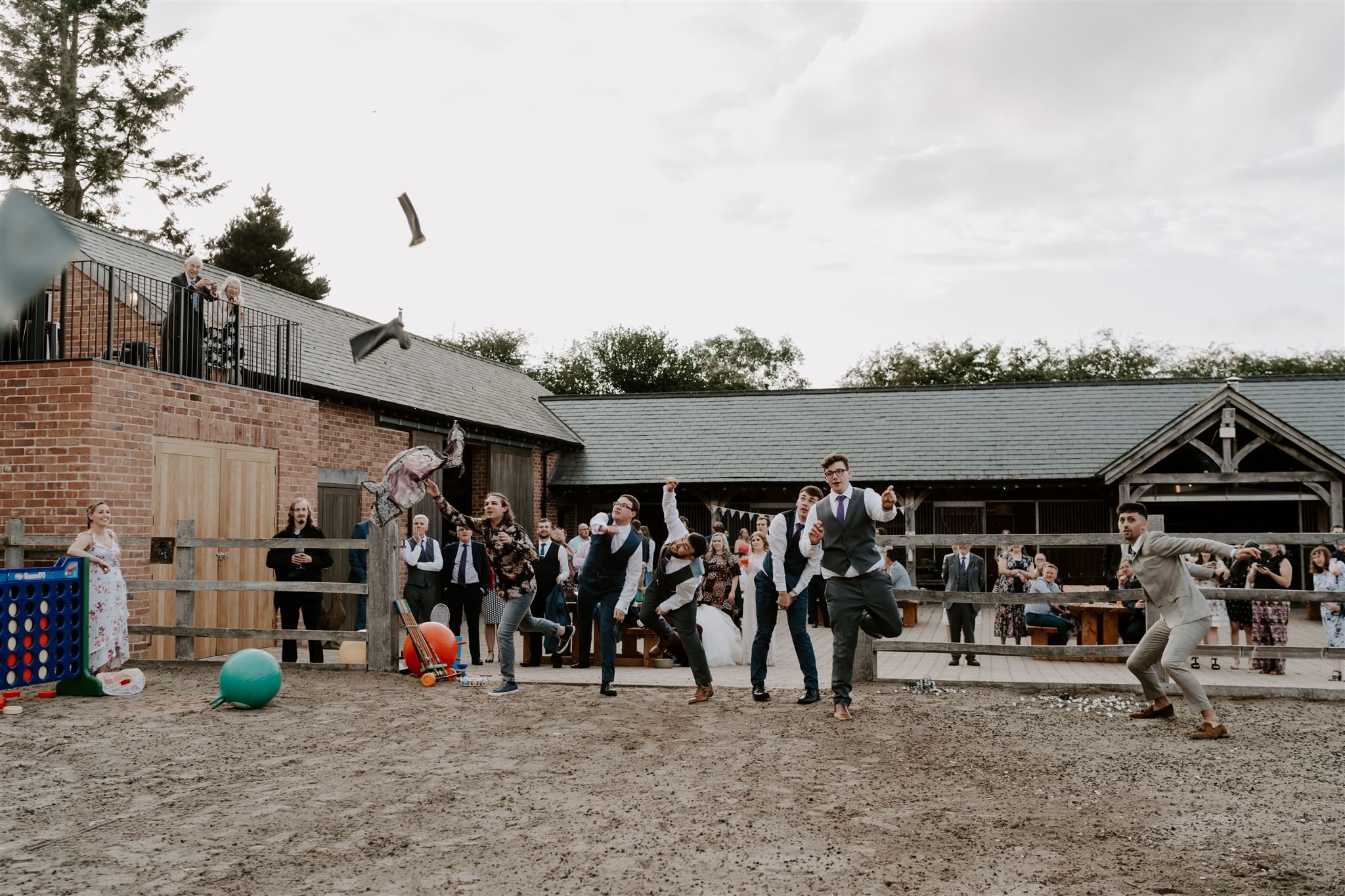 welly wanging outdoor wedding fun documentary wedding photographs Nottingham