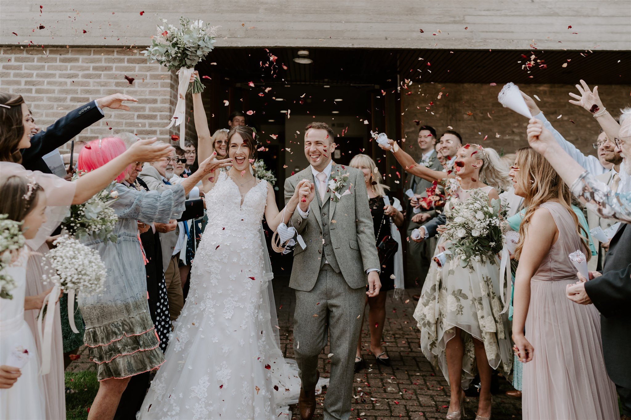 Leicester wedding photography red rose petal confetti