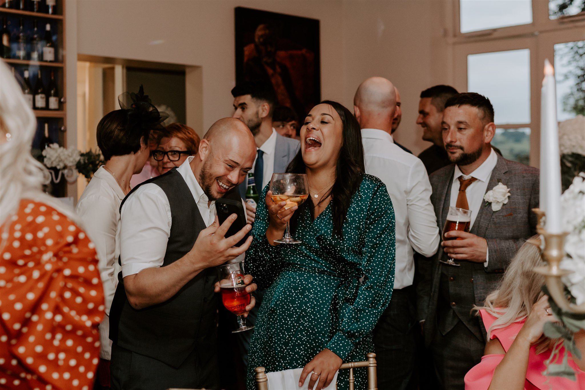 guests laughing Shottle Hall wedding