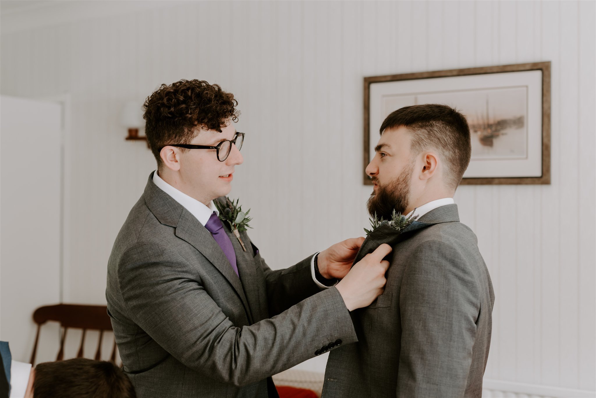 best man helping groom get ready Stamford Wedding photographer