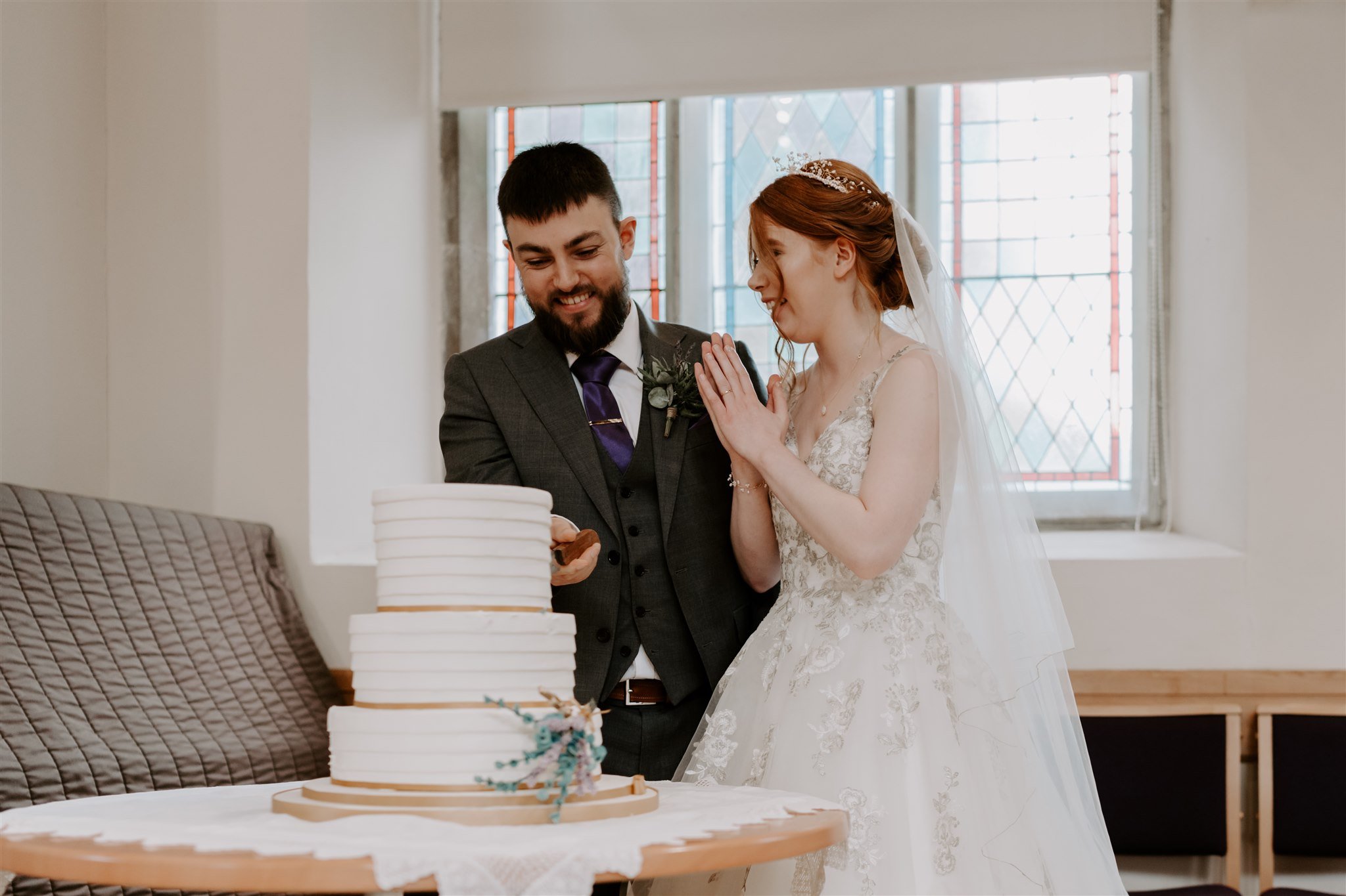 wedding cake cut after wedding ceremony Stamford methodist church wedding photographer