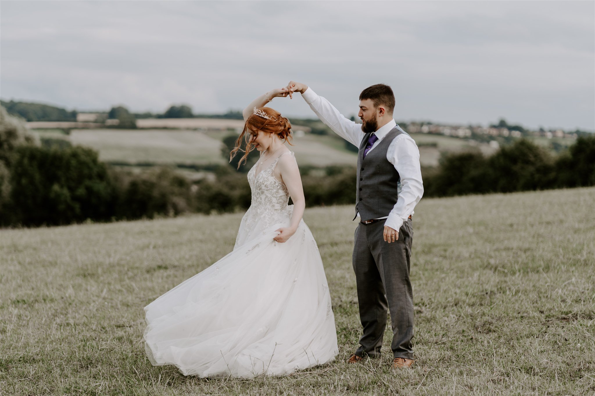 groom twirling bride Stamford wedding photographer 