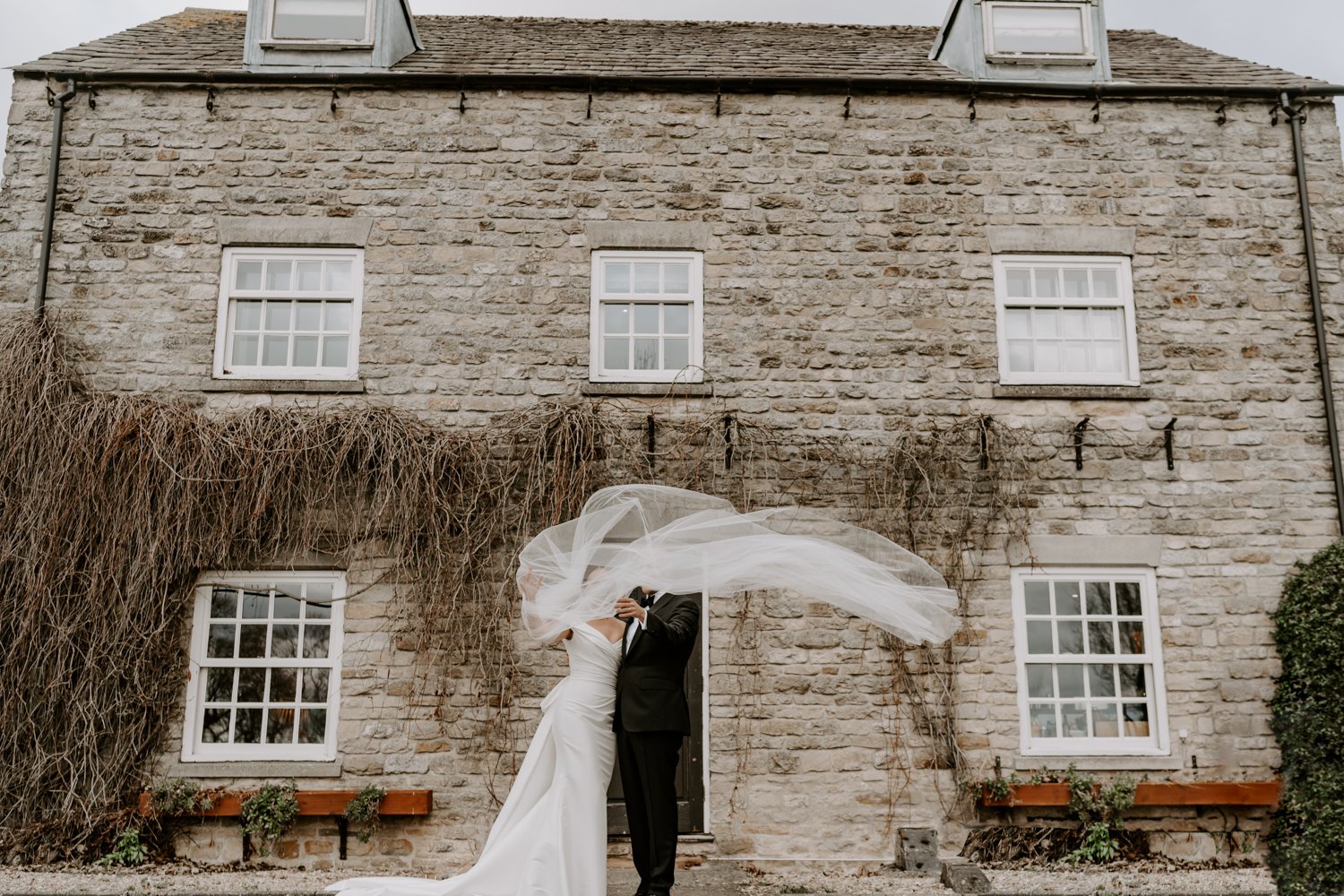 bride veil blowing wind Barnsdale lodge wedding photography
