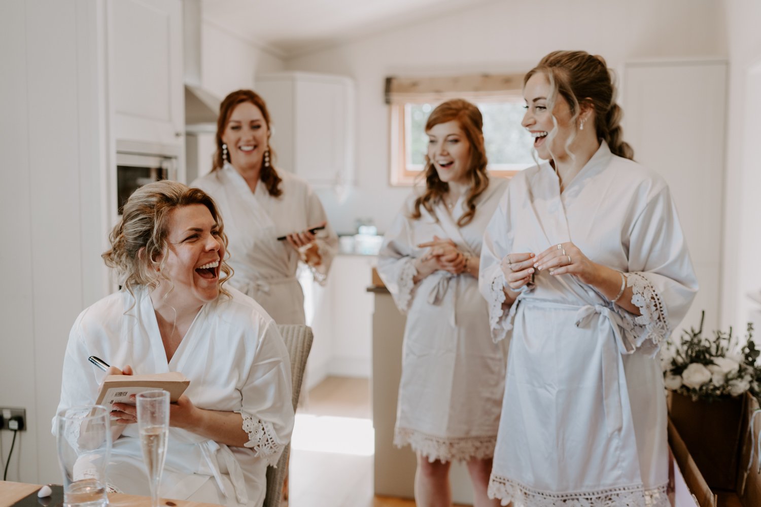 bride getting ready with bridesmaids Barnsdale lodges Rutland