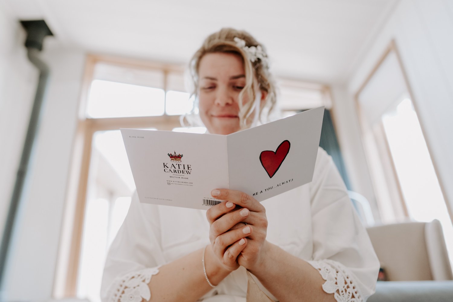 bride reading wedding card Katie Cardew card rutland