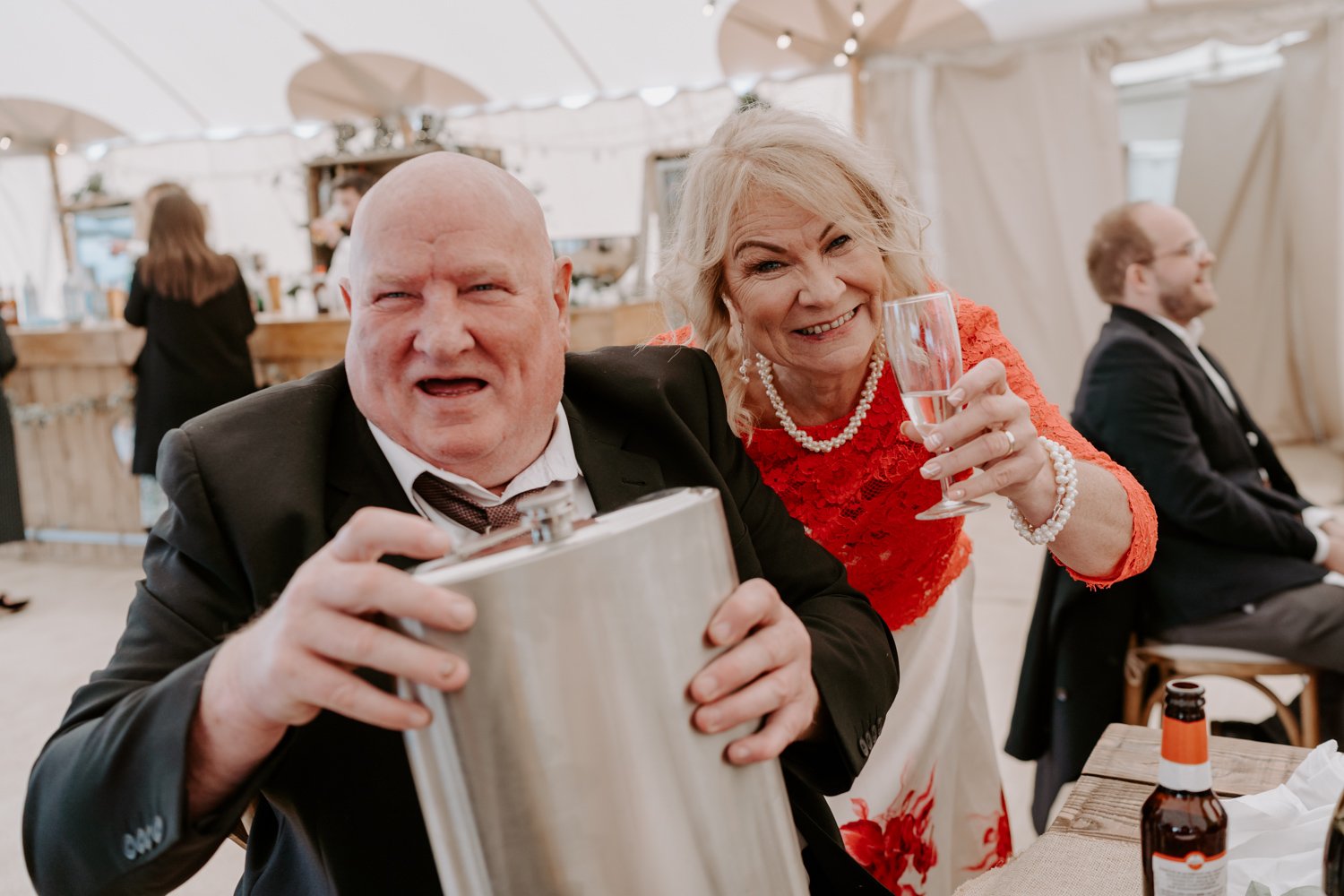 guests drinking giant hipflask Halfmoon farm wedding Hambleton