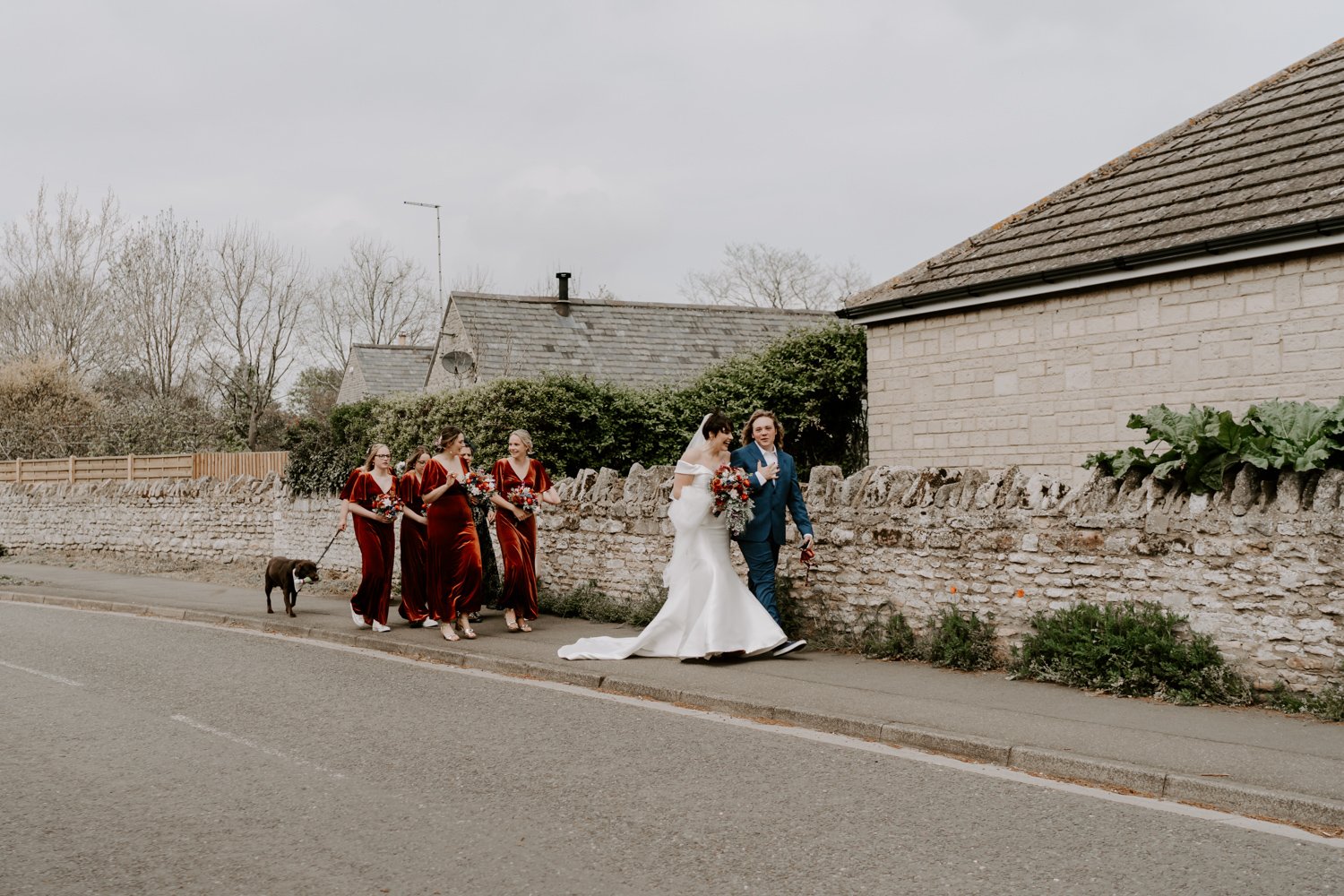 bride bridesmaids walking through Castor to church wedding Peterborough