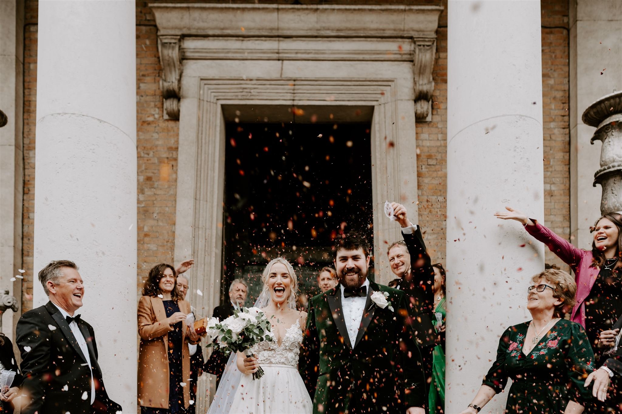 wedding confetti thrown Asylum Chapel Top London Wedding venue
