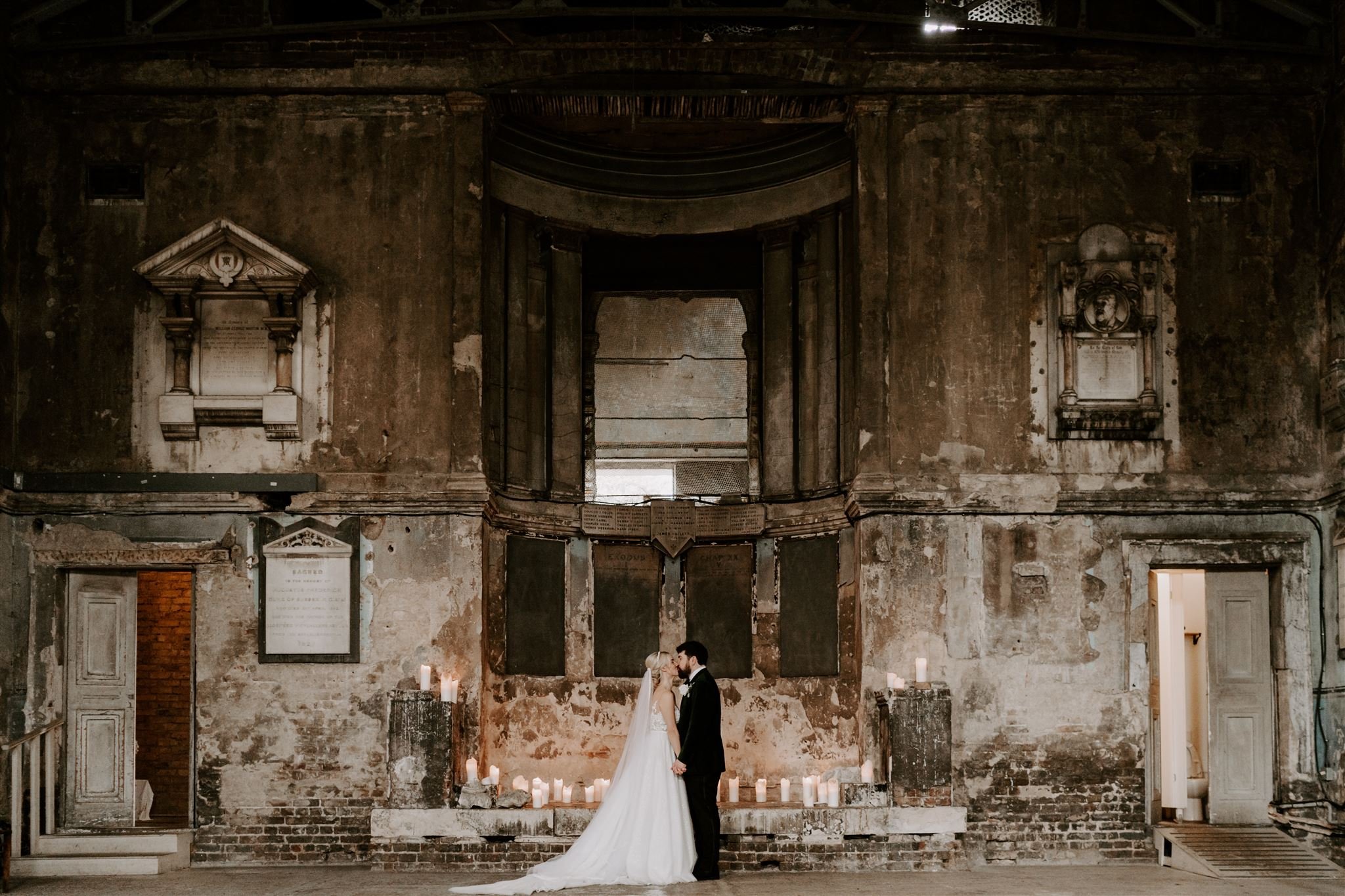 couple standing at alter Asylum chapel wedding Top London Wedding venue