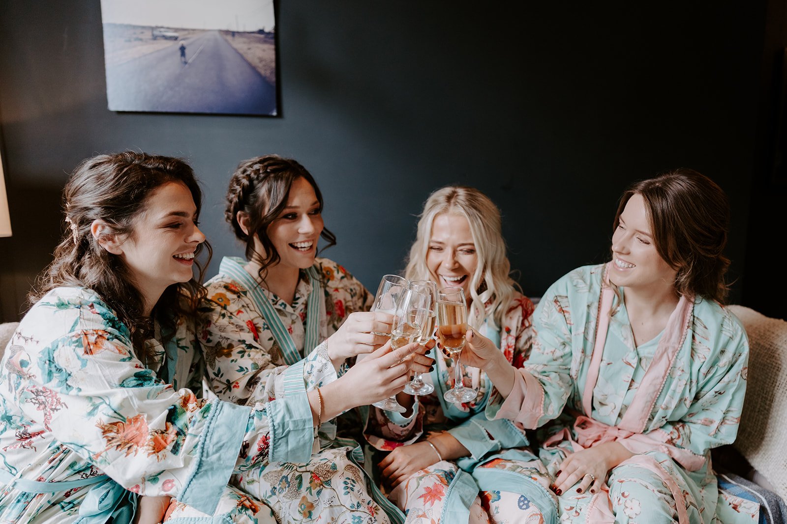 bride and bridemaids celebrating matching dressing gowns London wedding photography