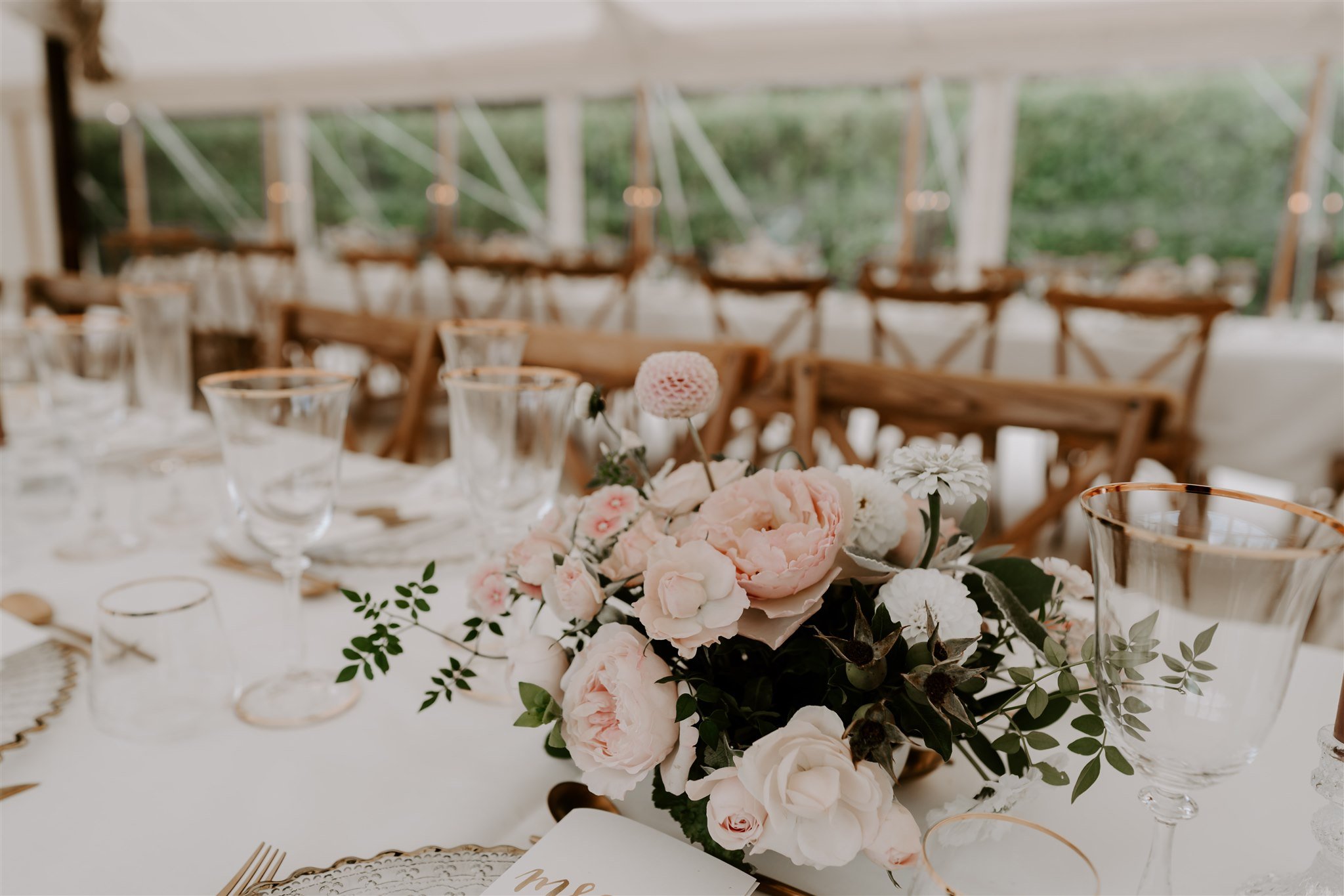 pink floral centrepiece Stamford marquee wedding 