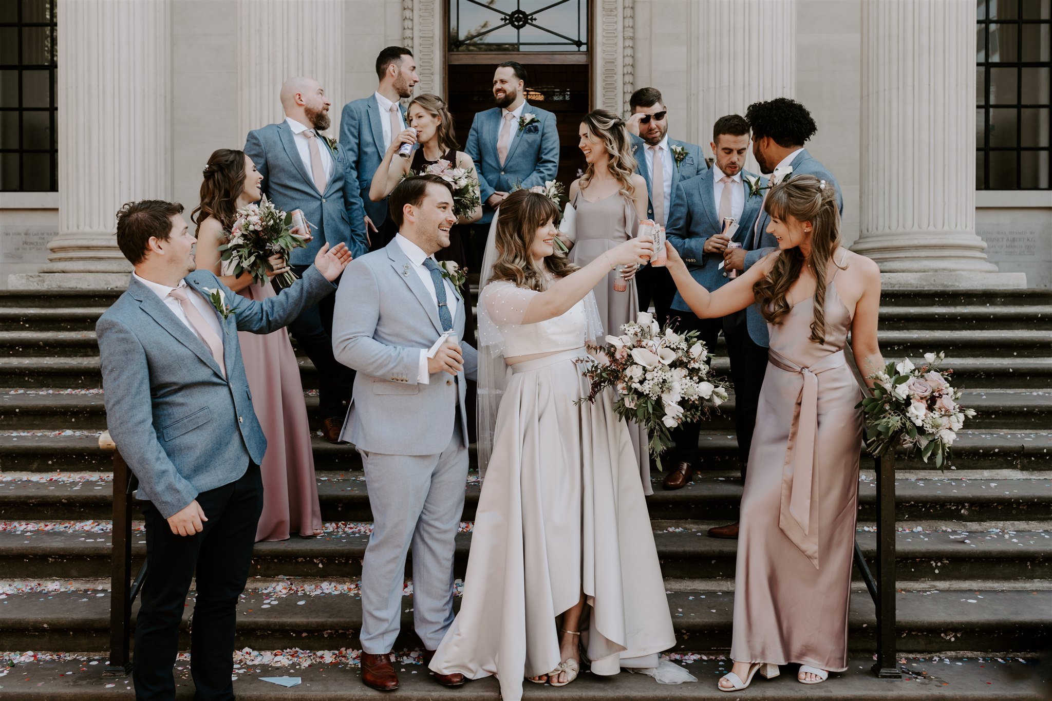 Old marylebone Town hall wedding group photo front stairs London wedding pizza party