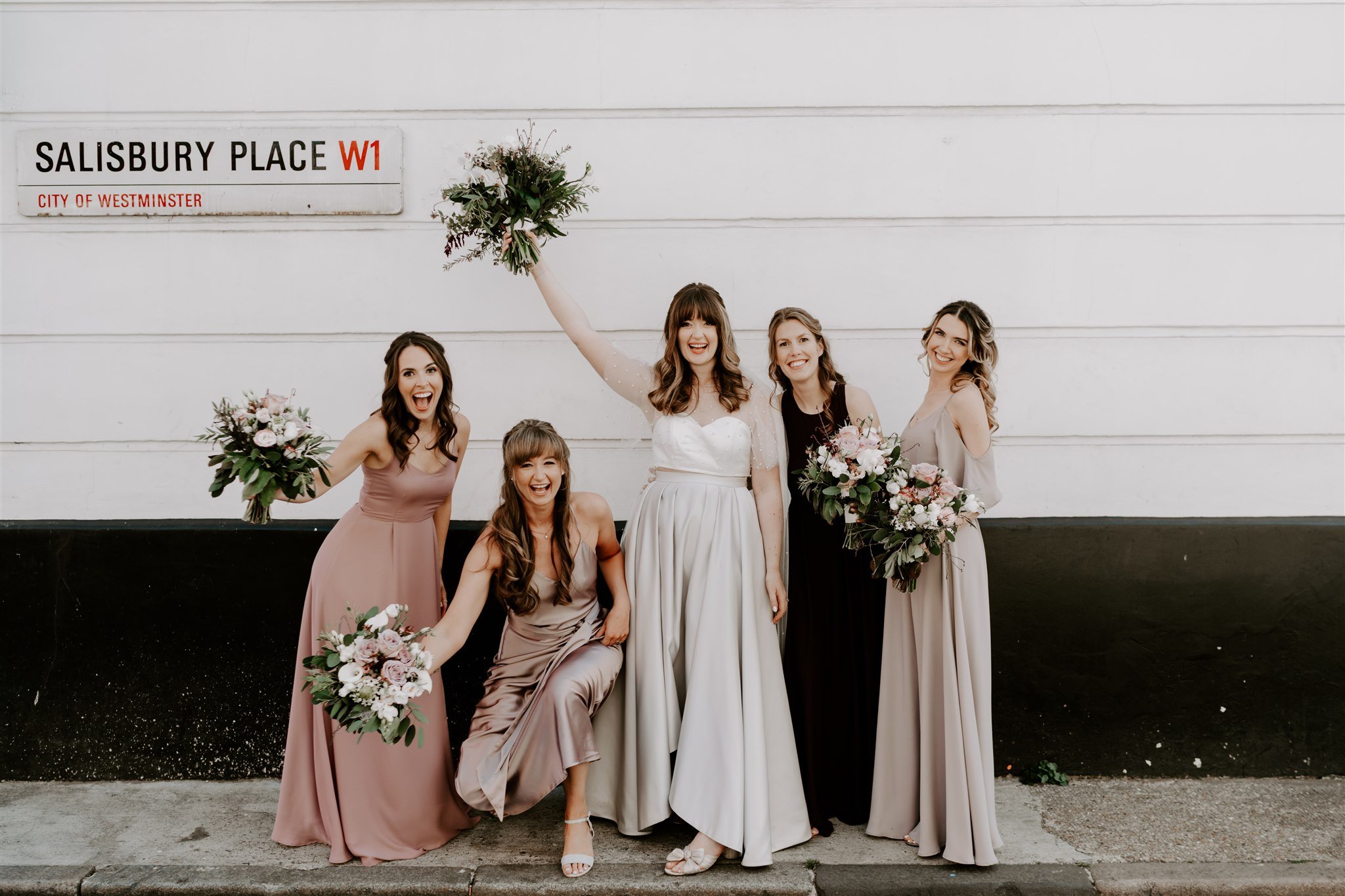 bridesmaids group photo London pizza party wedding