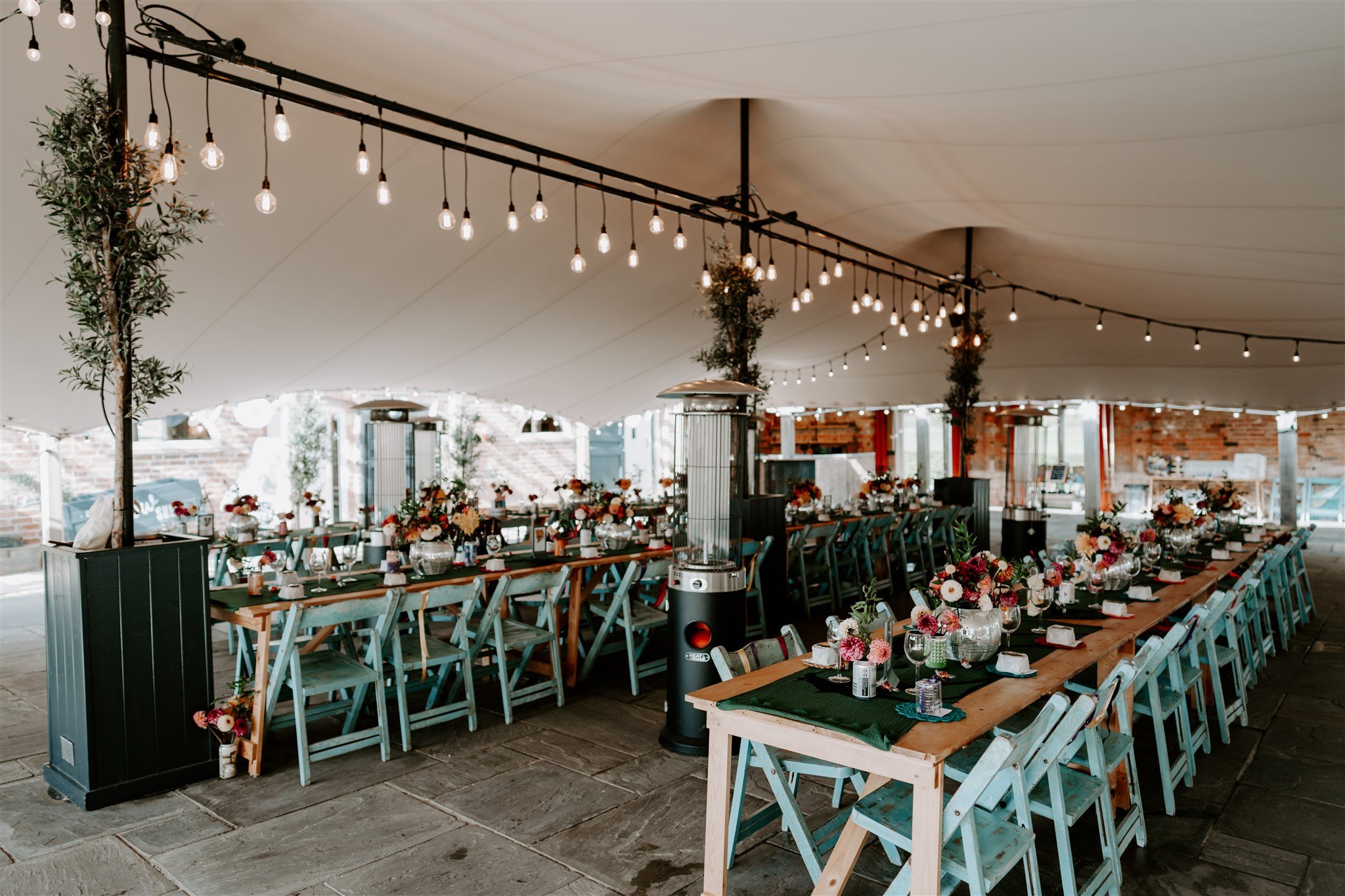 old cow shed wedding breakfast set up Leicestershire