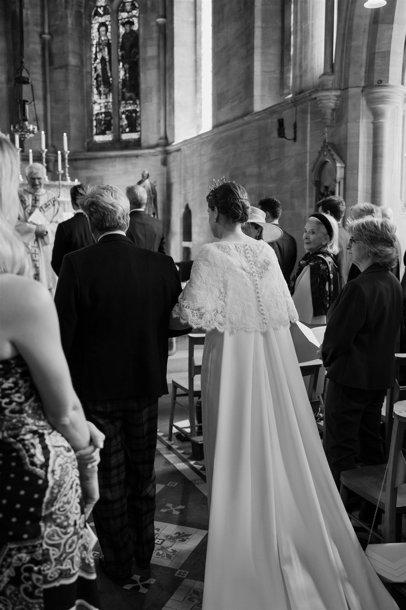 bride walking down aisle with father exton chapel rutland marquee wedding
