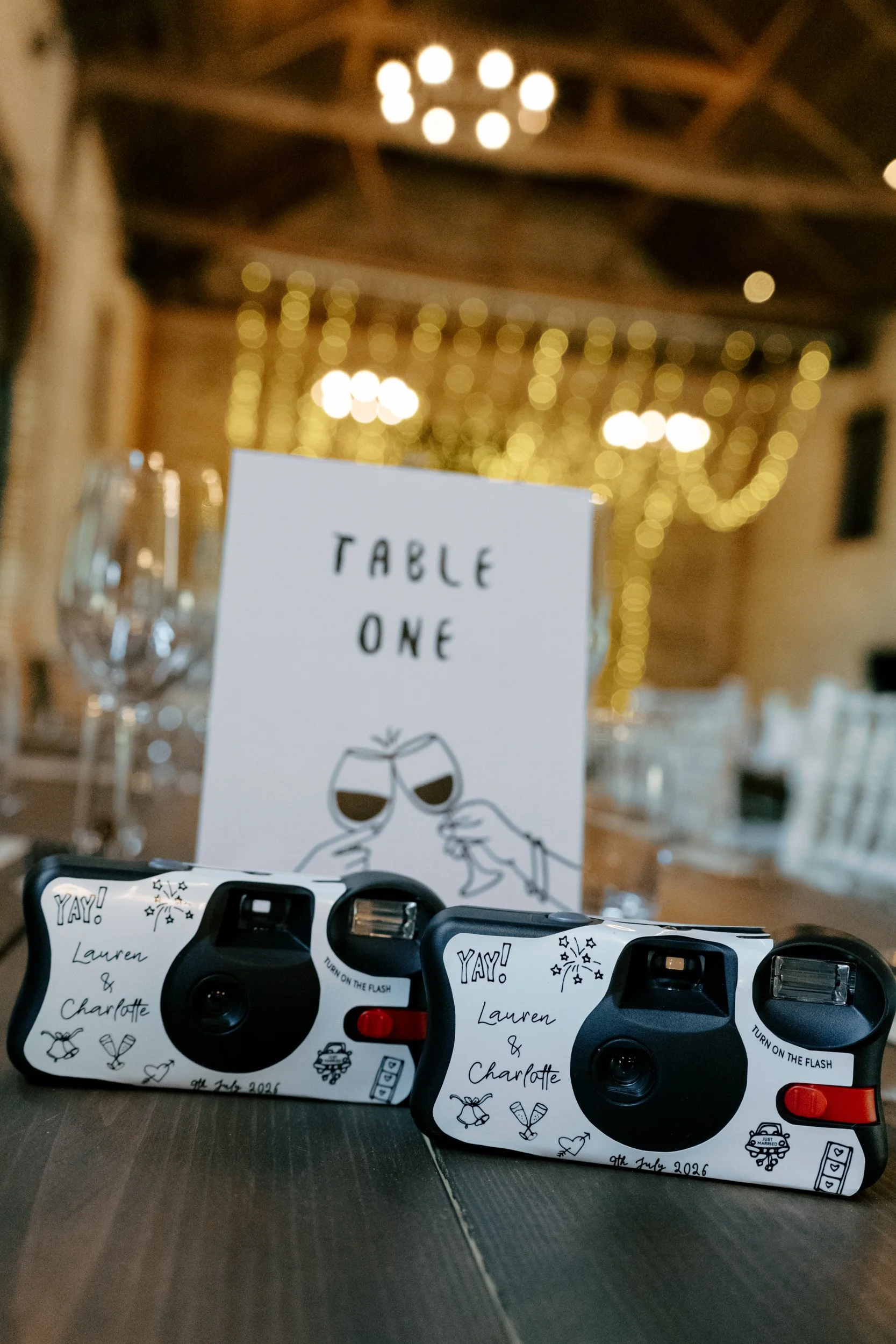 Disposable camera on a wedding reception table | Gina Fernandes Photography
