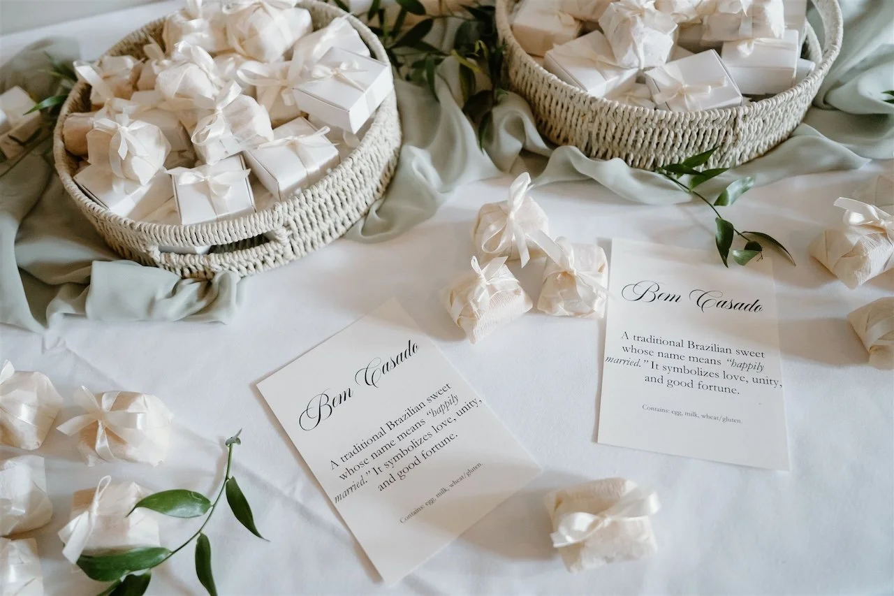 Brazilian bem casado wedding favours displayed on a table during a Stamford wedding reception