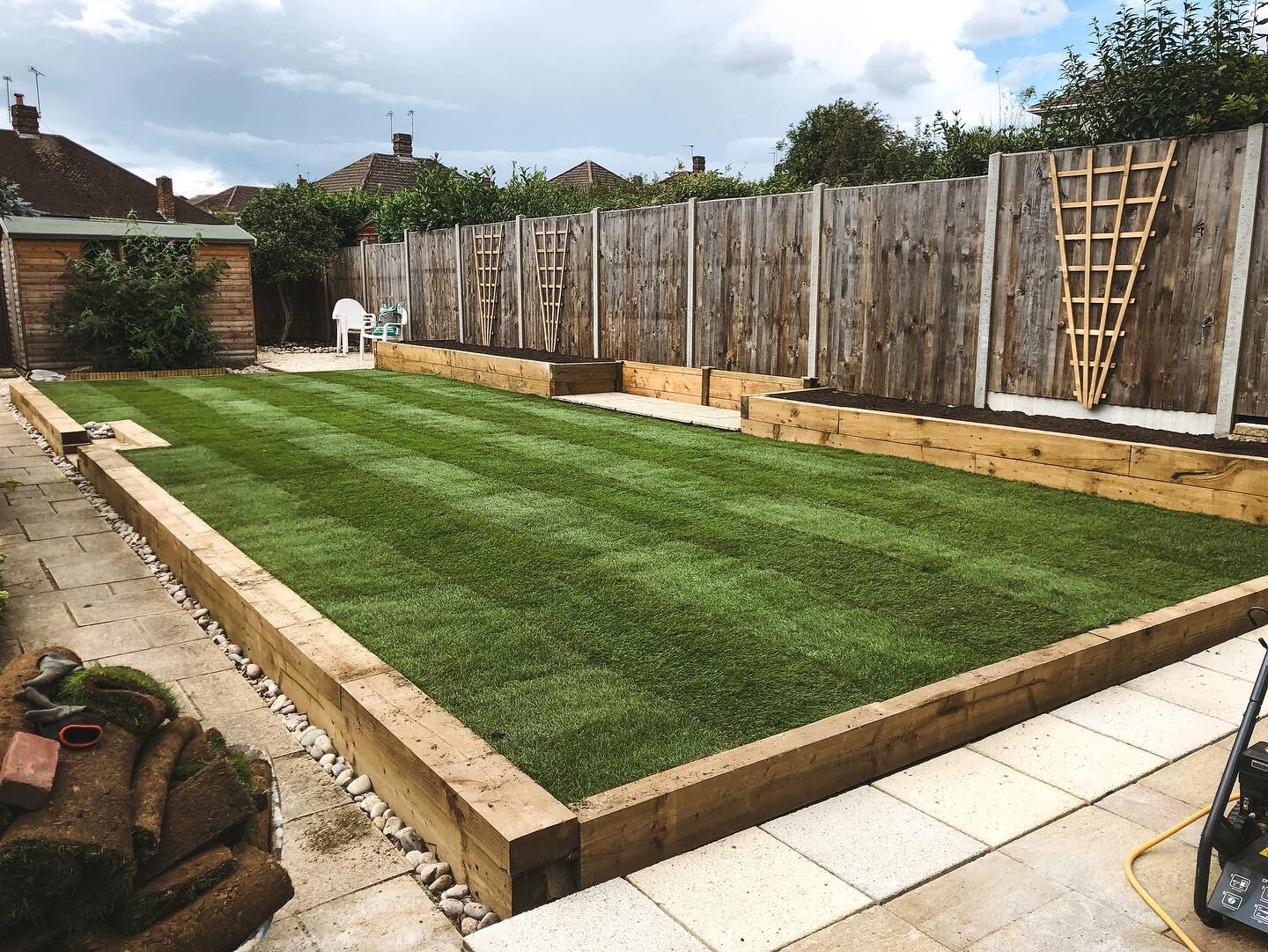One of our latest projects was to create a low maintenance garden so we removed and replaced the old mesh fence, all the old brick walls were taken out and were replaced with modern sleeper walls with steps leading up to the new lawn. We included 2 l