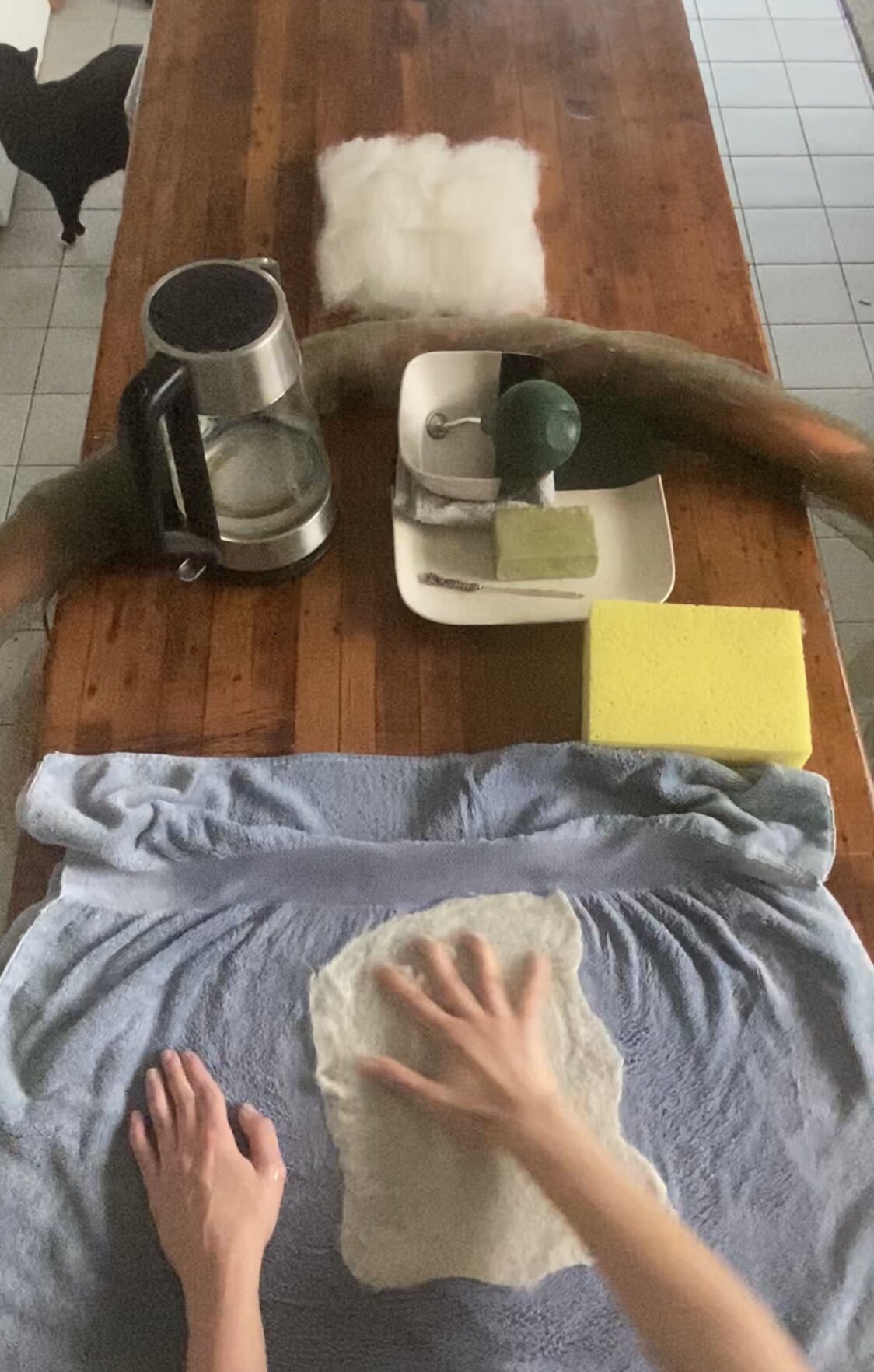 Fulling- When the felt has stabilized, remove the synthetic netting and continue fulling by hand.