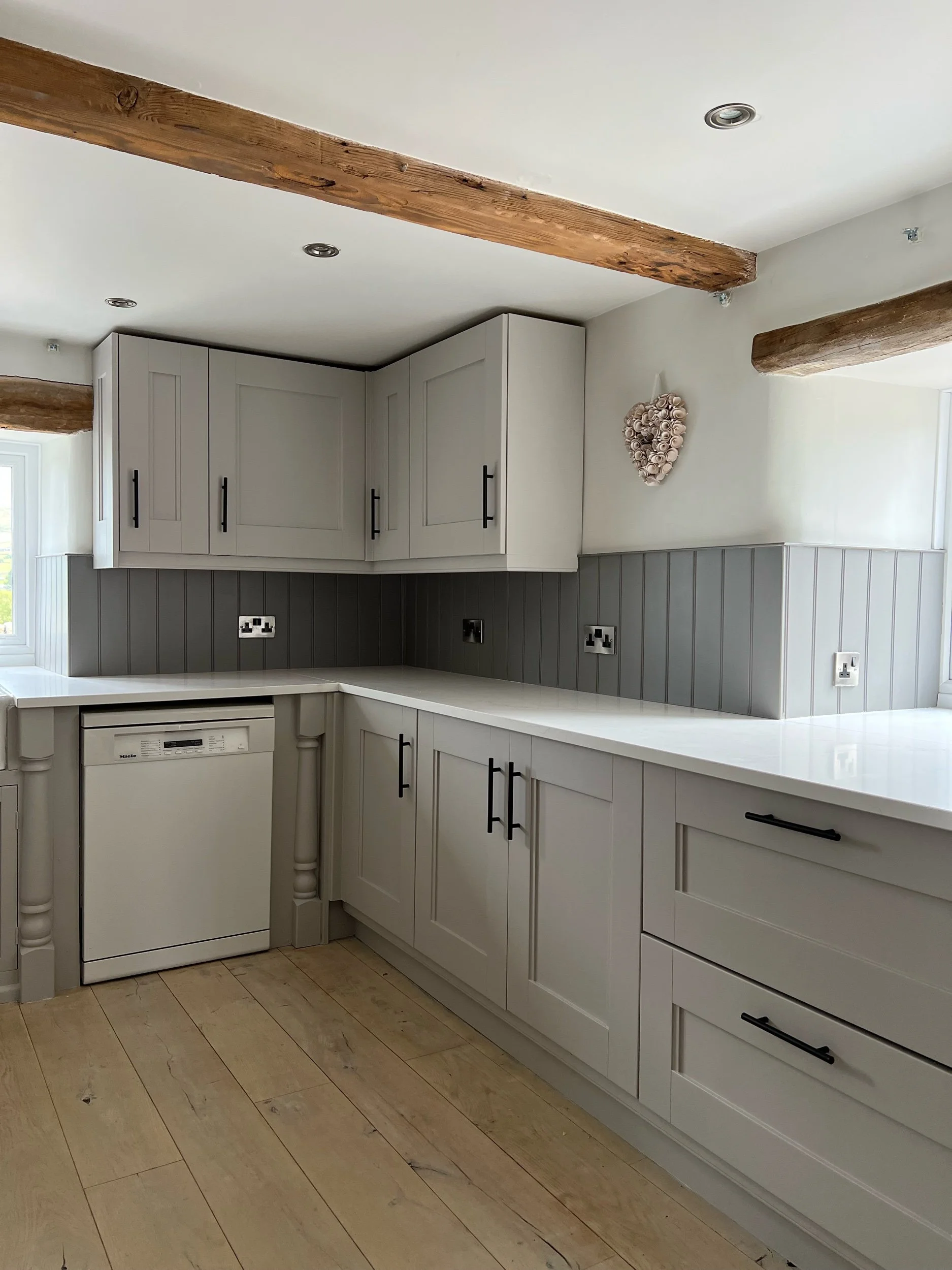  Painted kitchen units by Rob Greenwood Painting and Decorating. Kitchen Painter and Decorator based in West Yorkshire and North Yorkshire 
