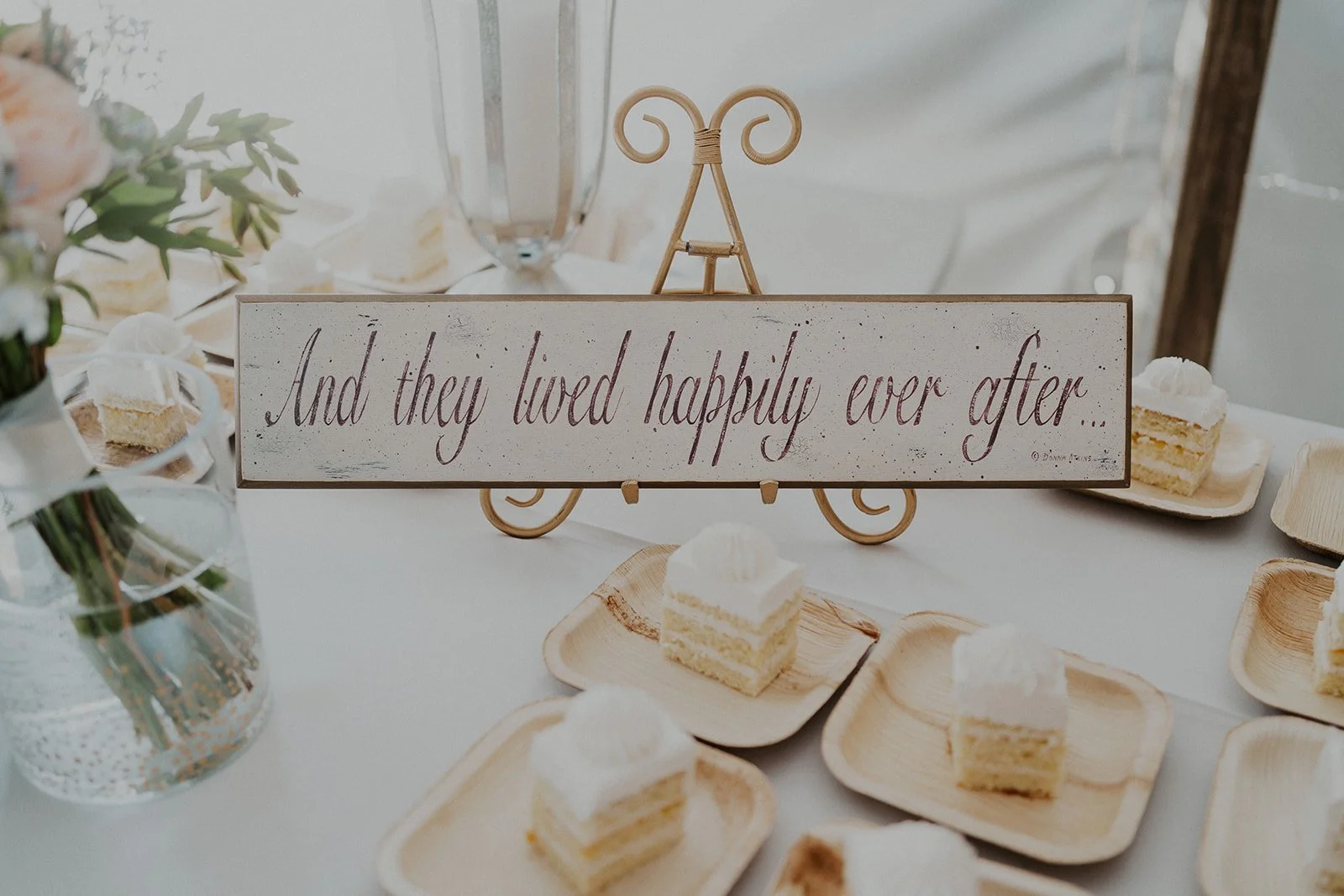 wedding cake and decor at intimate reception