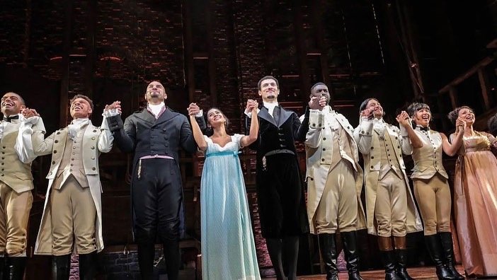 opening night bow hands up.jpeg