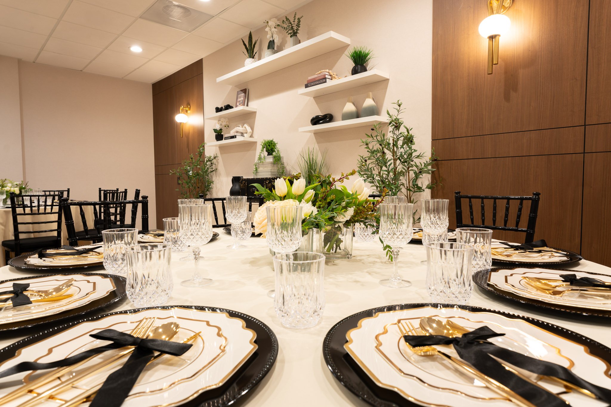 Event venue space in Los Angeles hotel with bouwuet and glasses and silverware