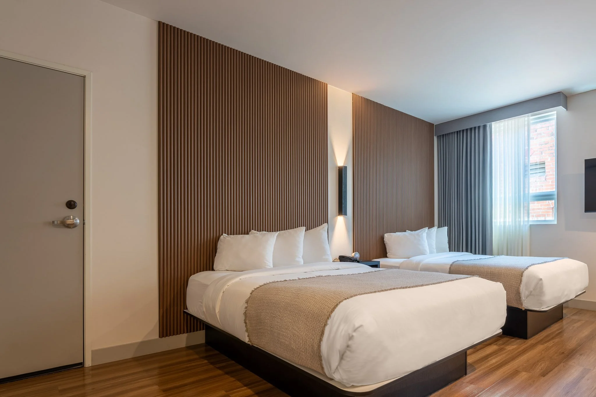 Double bed room in a sconce light