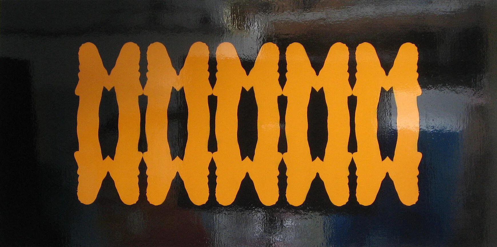 Orange  cutout of a row of women resembling sex toys on a black background.