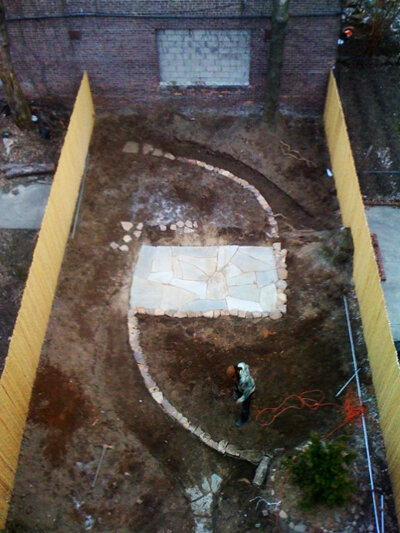 March 2008, first year, digging out the spirals and creating the patio with stone slabs on sand and concrete.