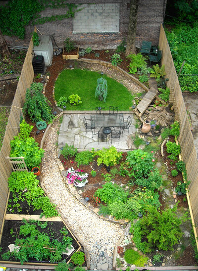 May 2008, bridge built to SW corner with back wooden platform, more paths constructed, plantings.