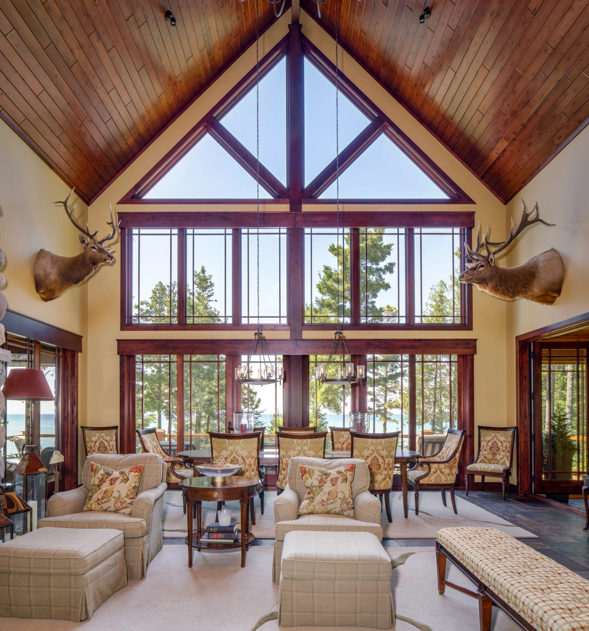 Huge Great Room / Dining Room with views of Lake Michigan in a luxury home near Charlevoix, MI.