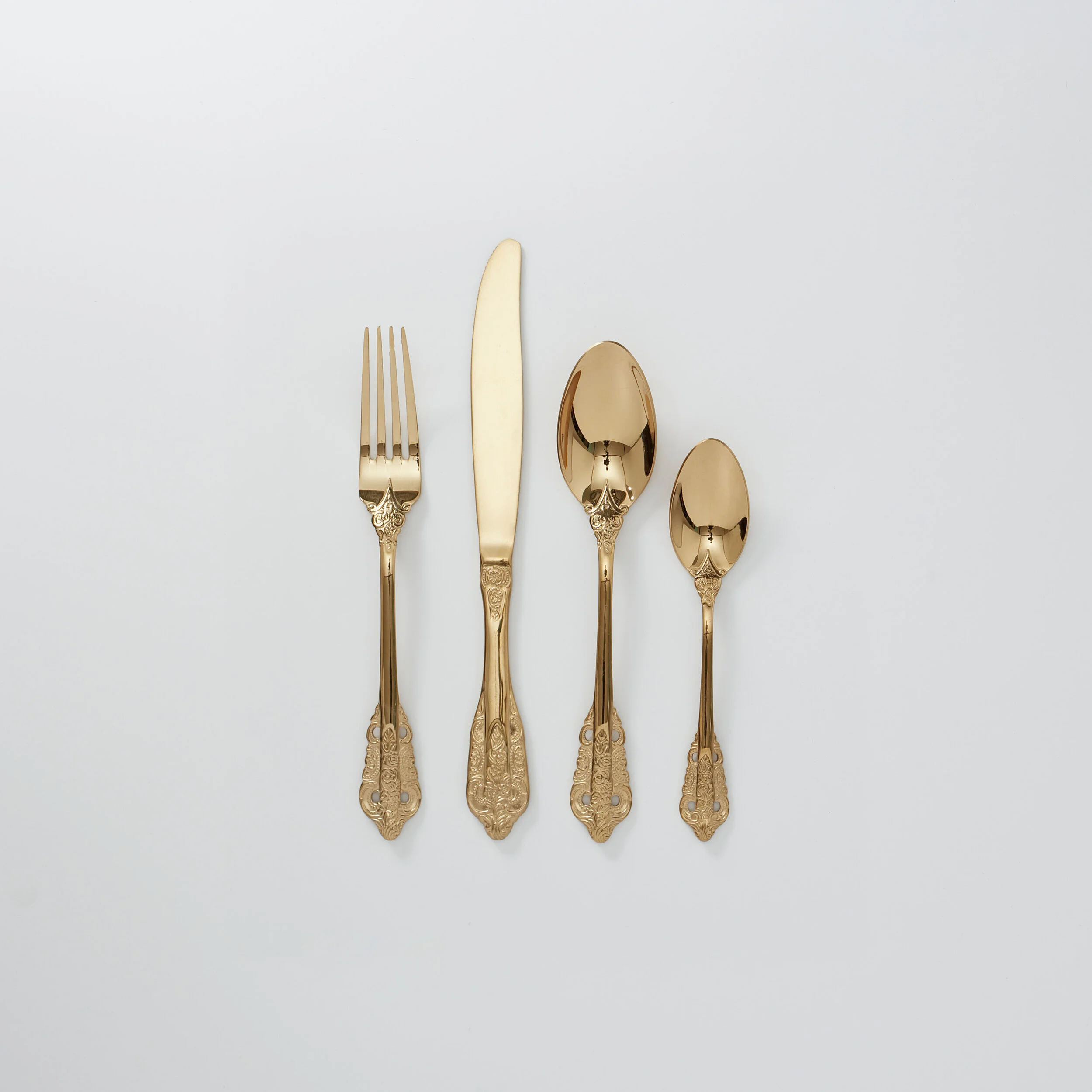 4-PIECE ROYAL GOLD STAINLESS STEEL CUTLERY