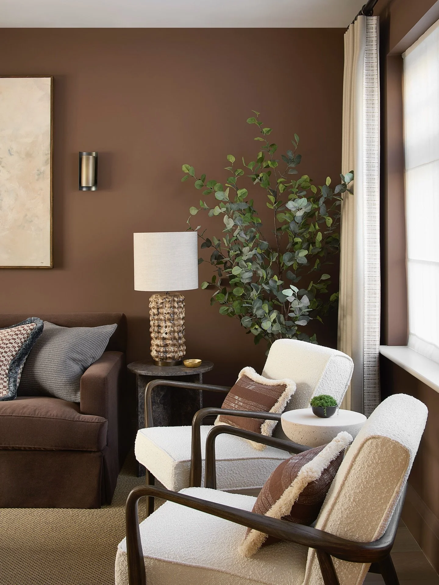 As autumn settles in around us, I wanted to share a scheme that perfectly captures the season&rsquo;s cozy spirit. This is the TV room at our Wimbledon project, where we painted the walls in a rich, rusty brown and layered the space with warm texture
