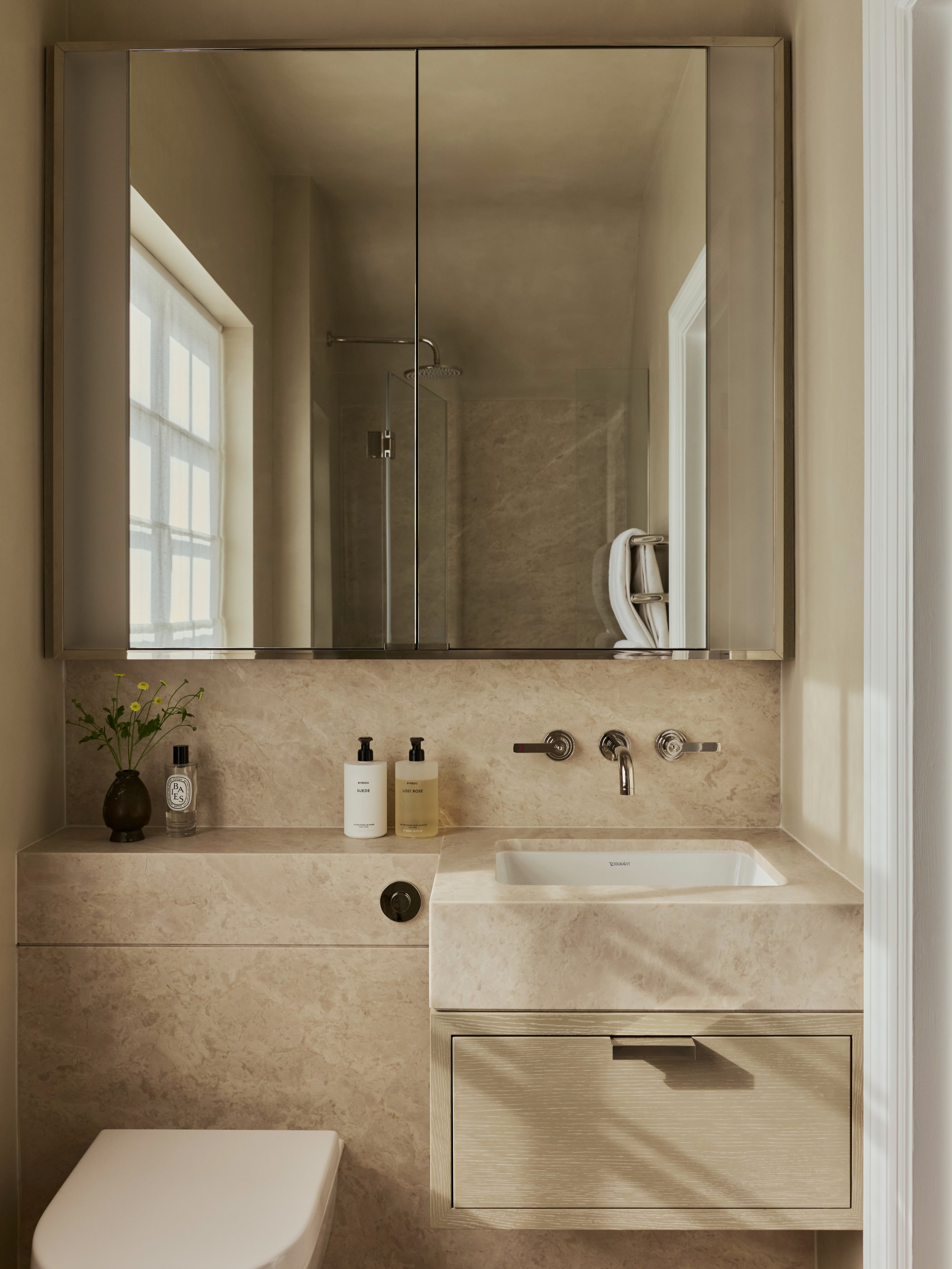 Bathrooms should be sanctuaries where we can retreat, relax and recharge.

At our Hampstead Arts &amp; Crafts project, we created a calming, spa-inspired atmosphere through the use of tactile microcement finishes, paired with beautifully veined natur