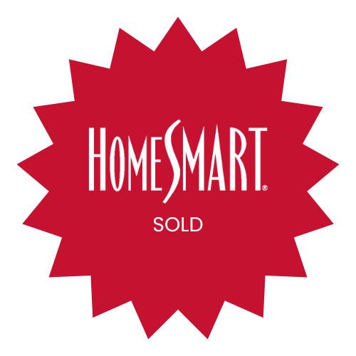 HomeSmart sold sign, red starburst design.