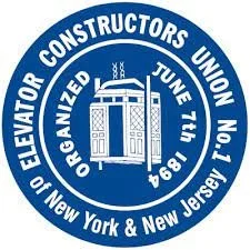 A circular blue emblem with white text and graphics for the Elevator Constructors Union, Oceanized Union No. 1, NJ & NY, June 7th, 689. The center features a building with elevator machinery.