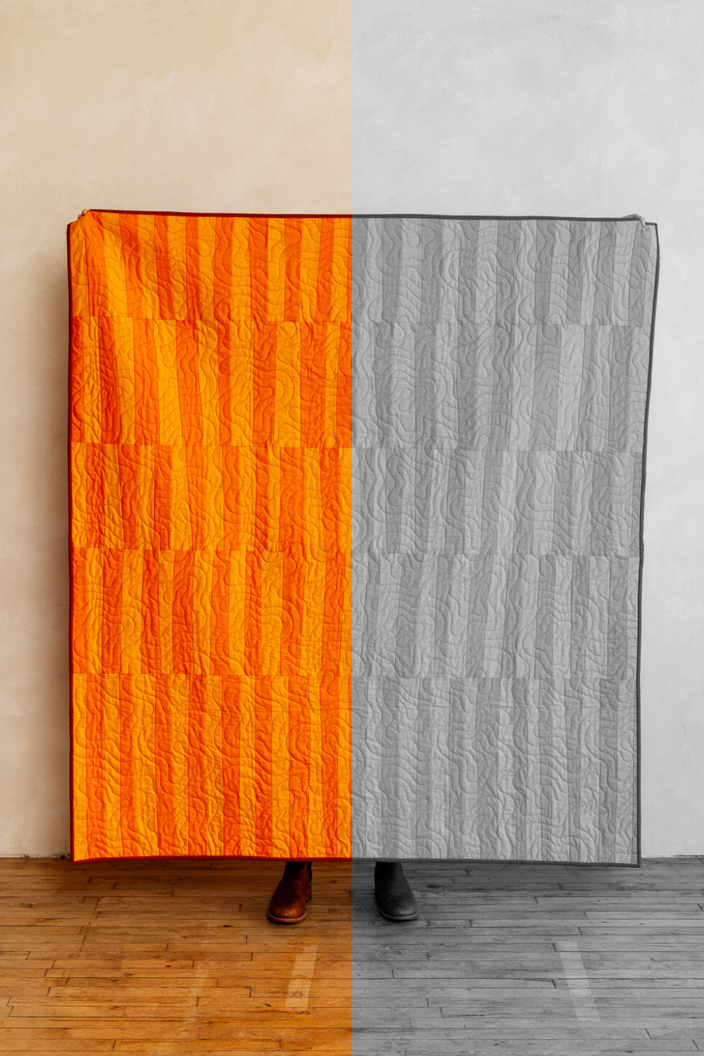 Low-contrast improv quilt made with two shades of orange, with a grayscale comparison.