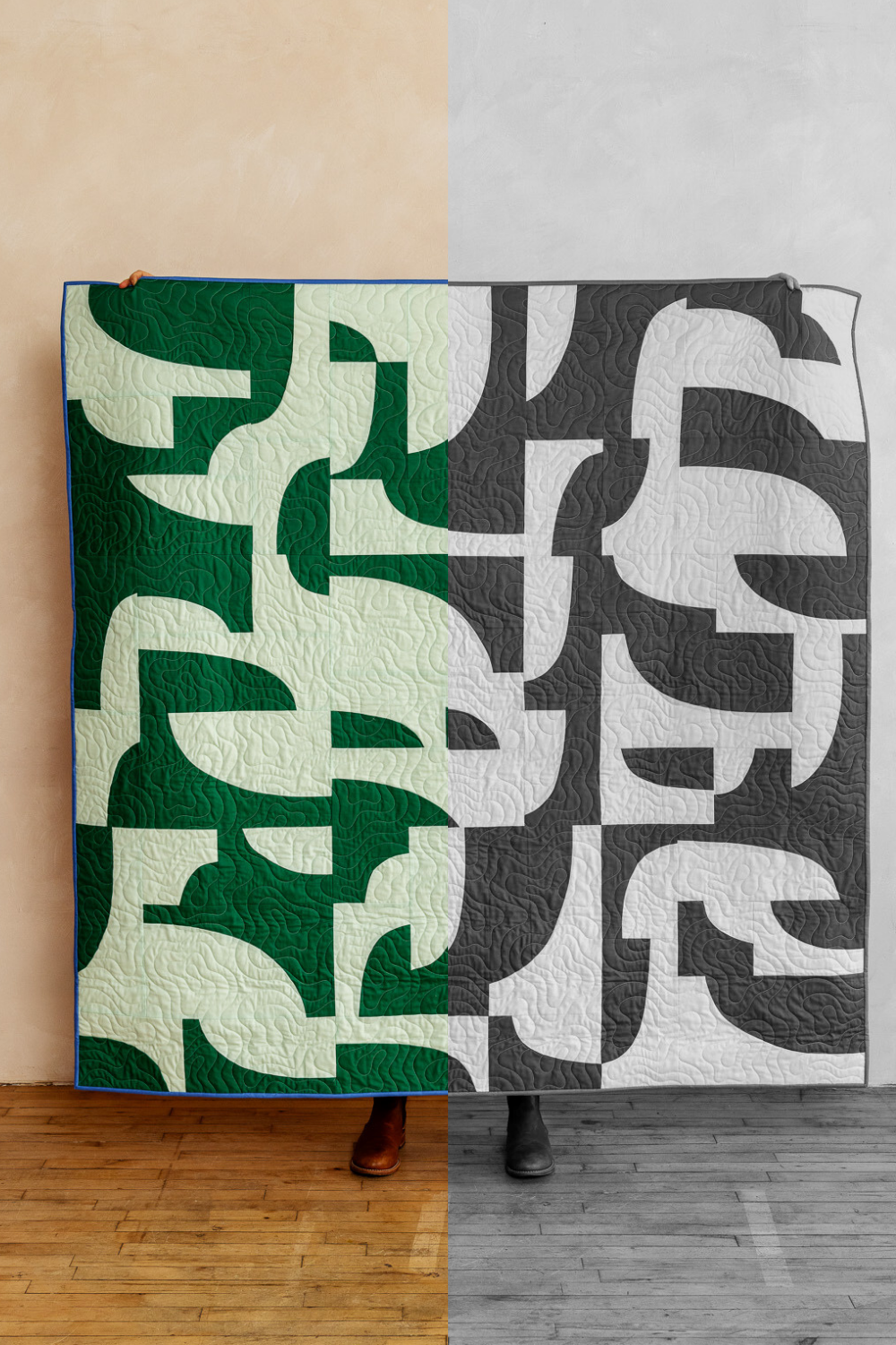 High-contrast improv quilt in green and cream on the left, grayscale on the right