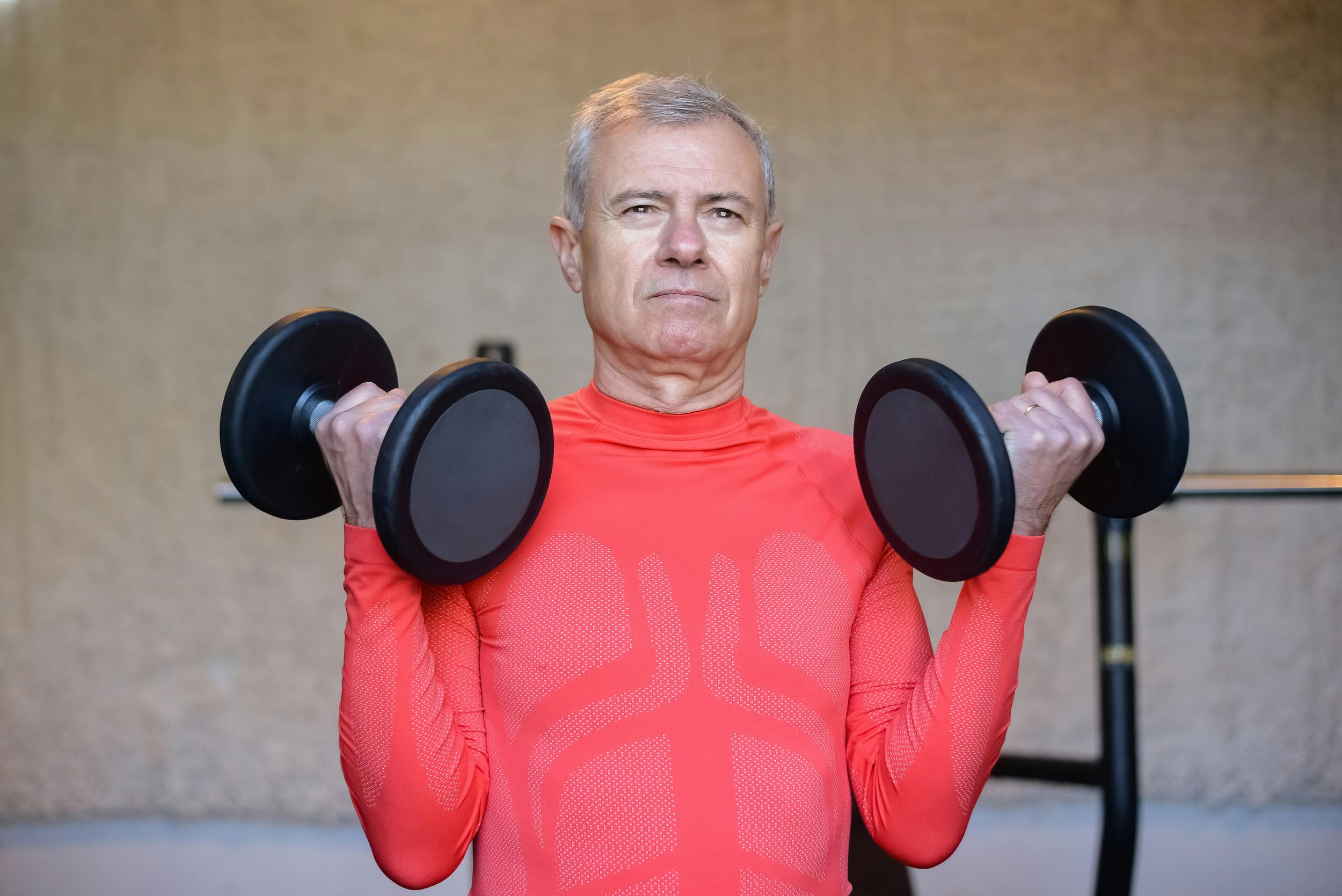 Adult male strength training to help his back pain