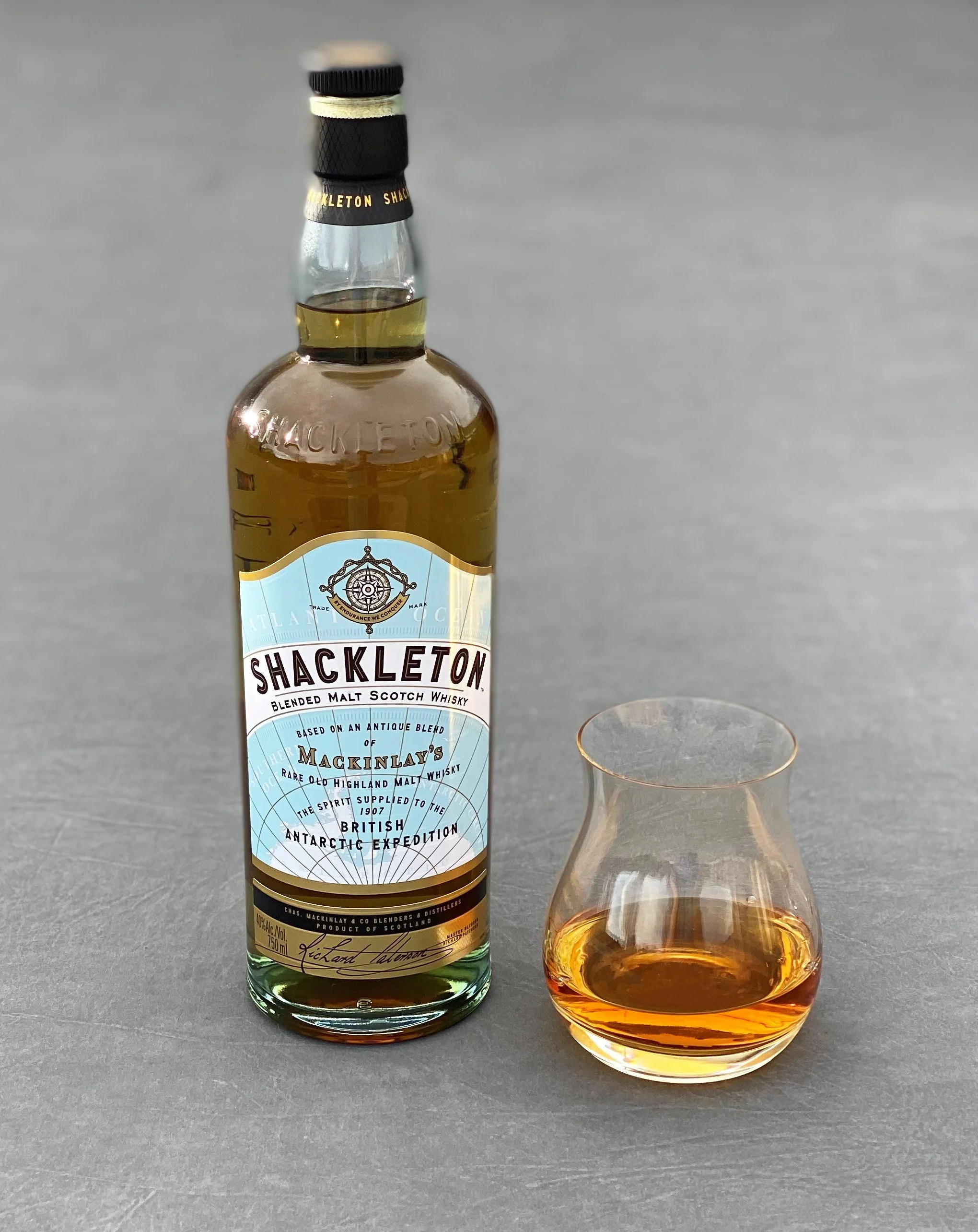 Bottle and glass of scotch whiskey
